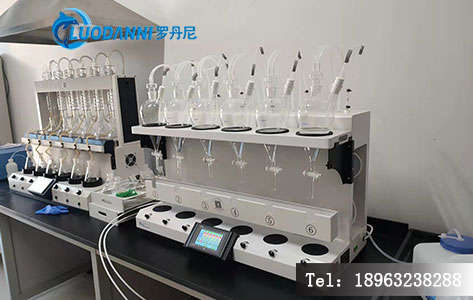 实验室实景图，技术人员正在操作罗丹尼设备，背景是整齐的样品架。或者是设备的&ldquo;防交叉污染测试报告&rdquo;截图。