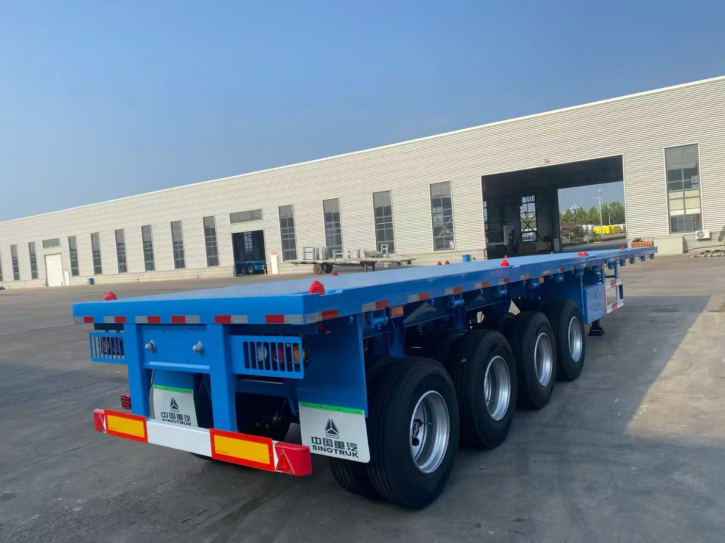 Four axles flat bed semitrailer