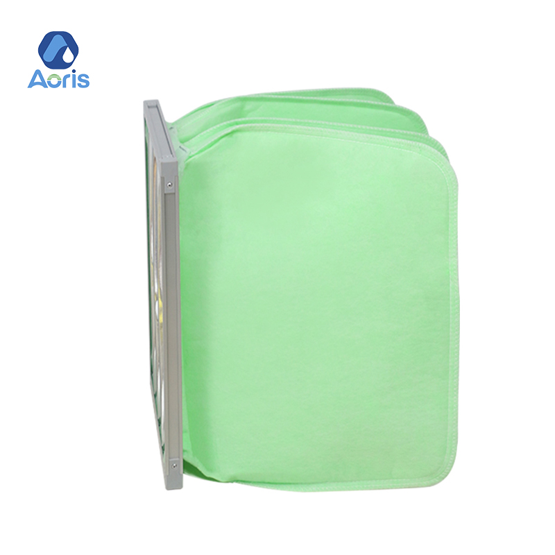 Green and white needle bag filter