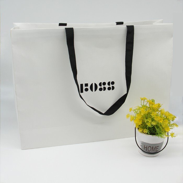 White Carved Paper Bags