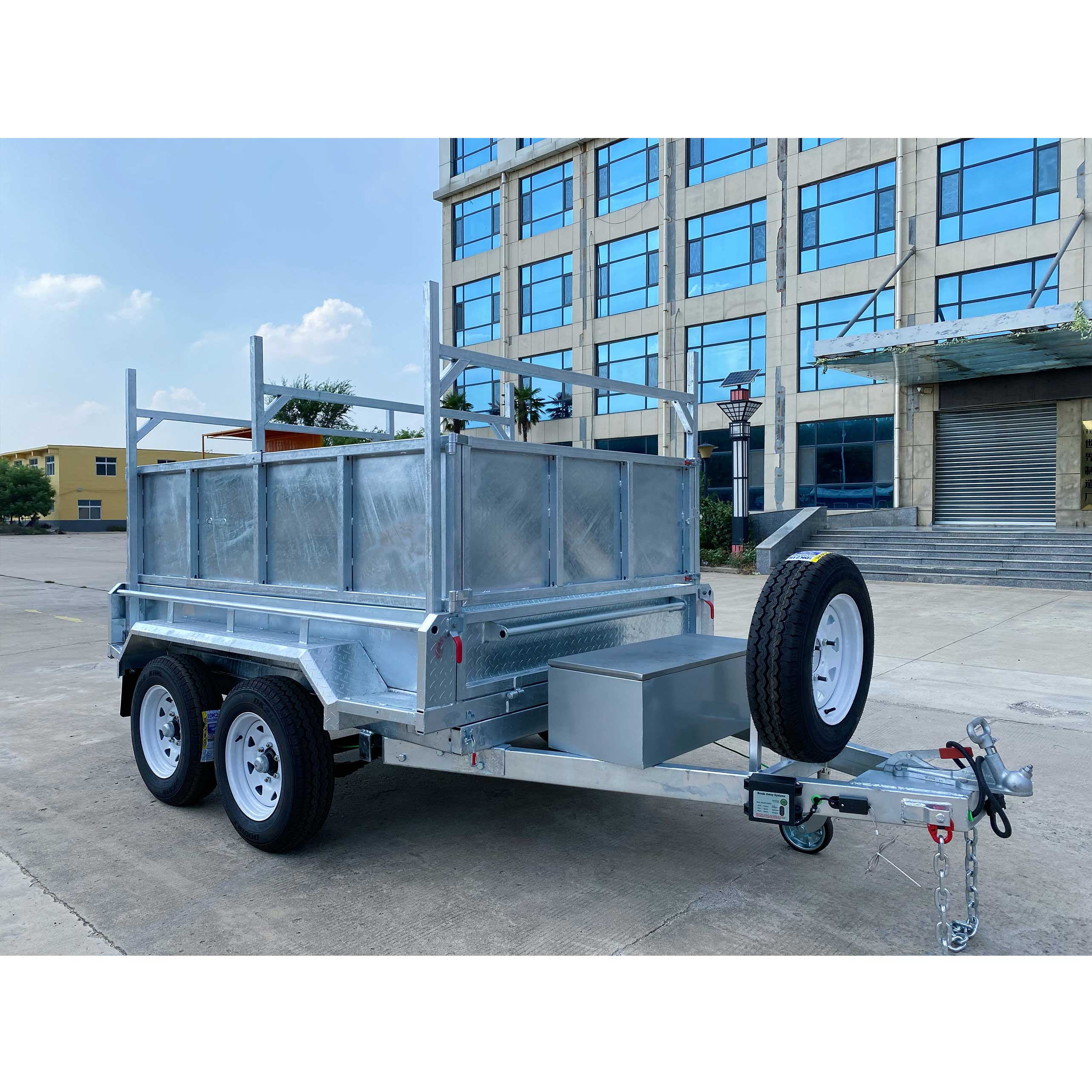 Double-axis dump box trailer