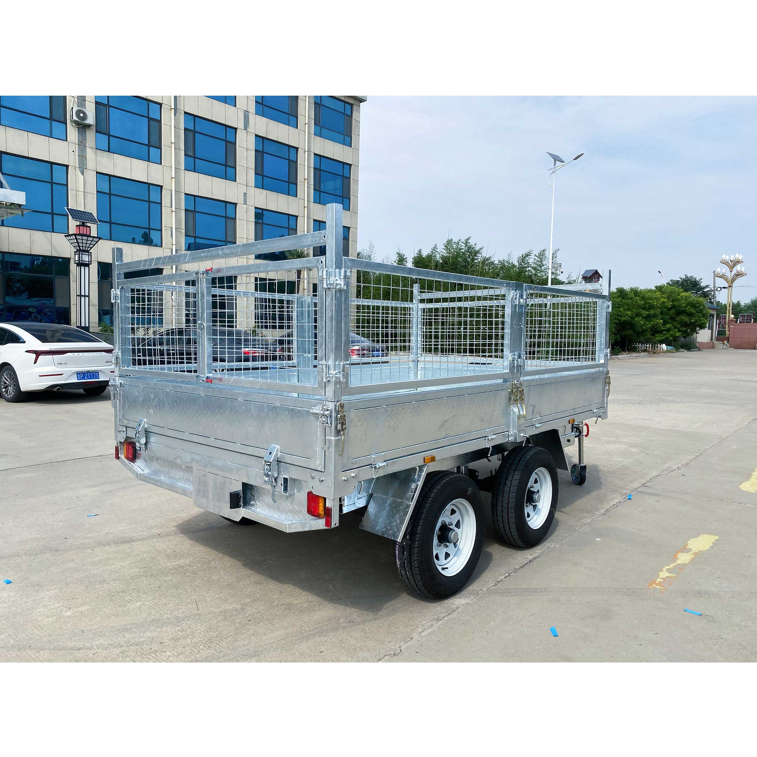 Double-axis dump cage trailer