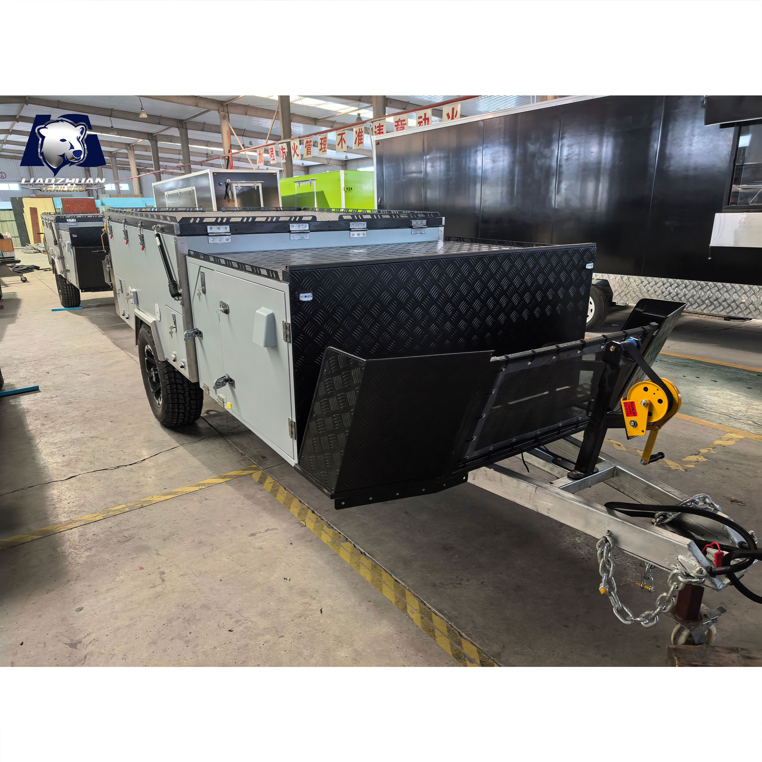 Front-folding hard-floor camping trailer