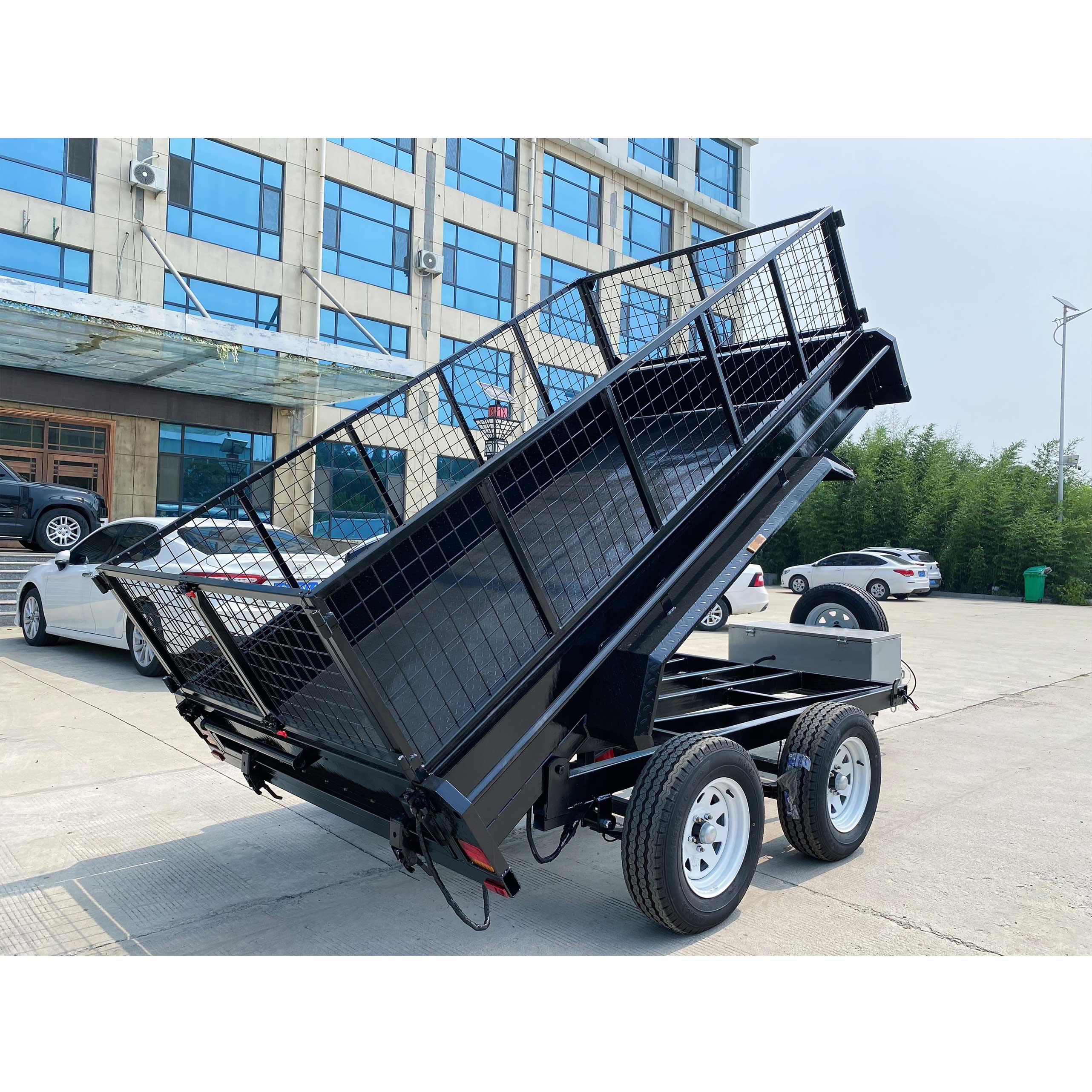 Double-axis black cage-type hydraulic dump truck trailer