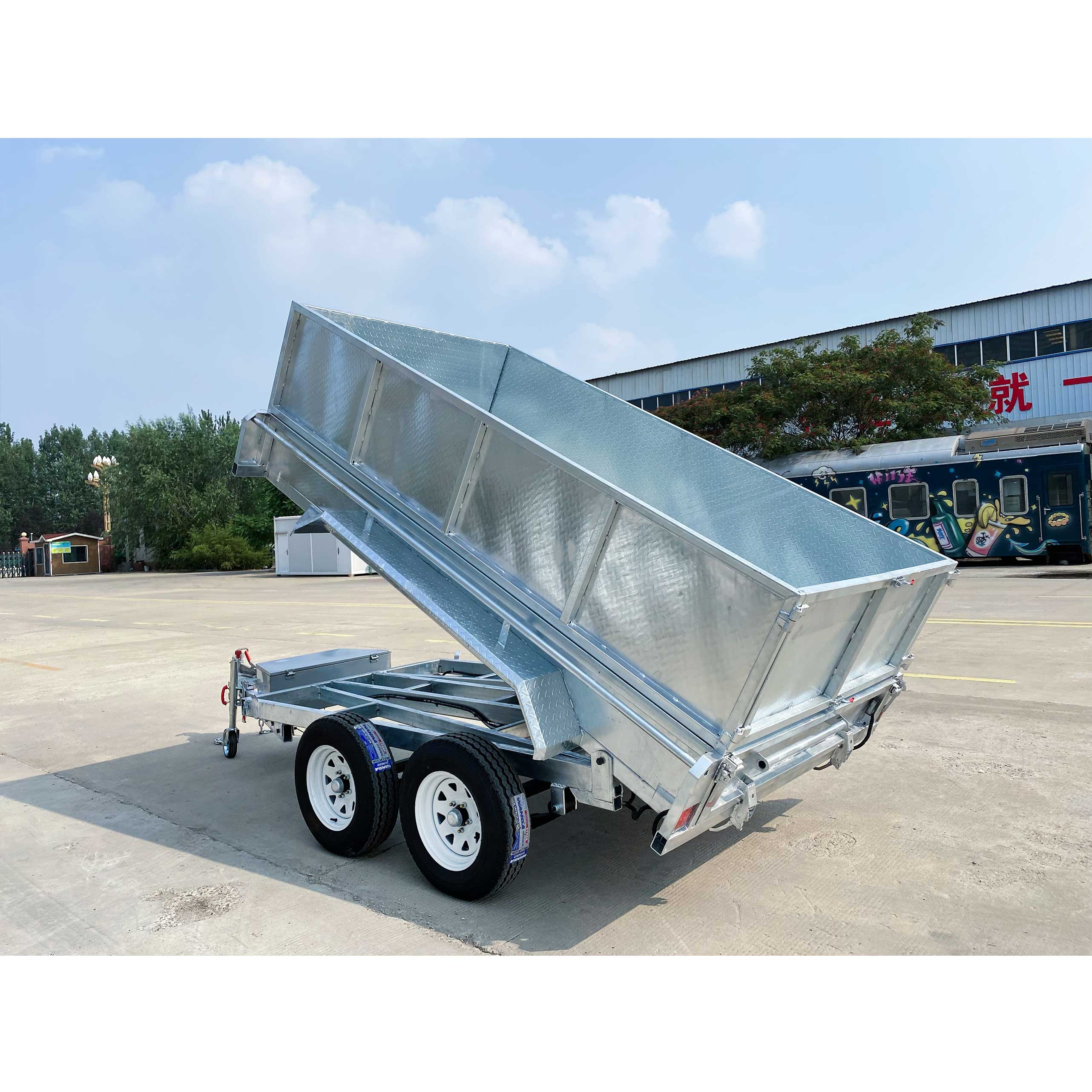 Double-box type self-unloading hydraulic agricultural trailer