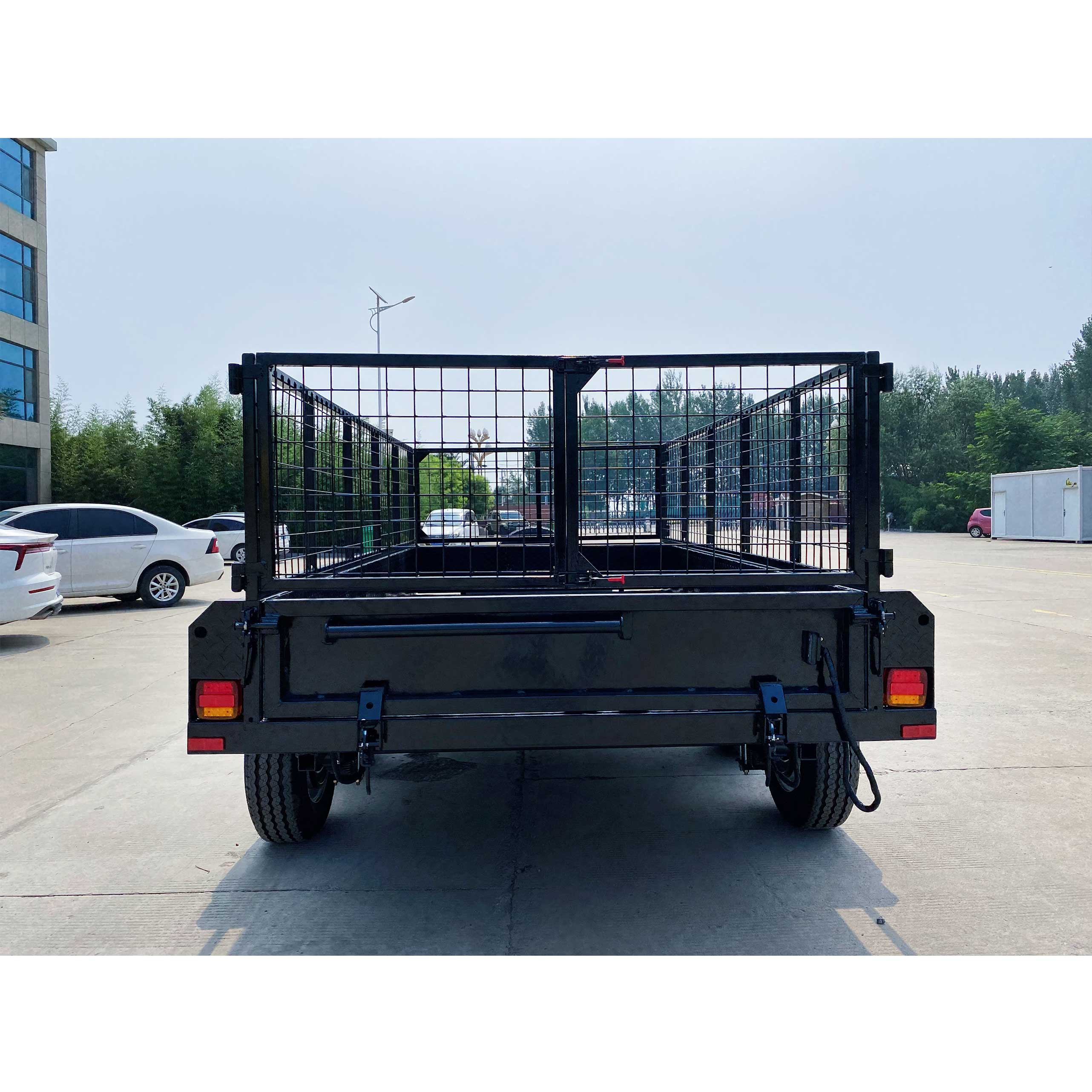 Double-axis black cage-type hydraulic dump truck trailer