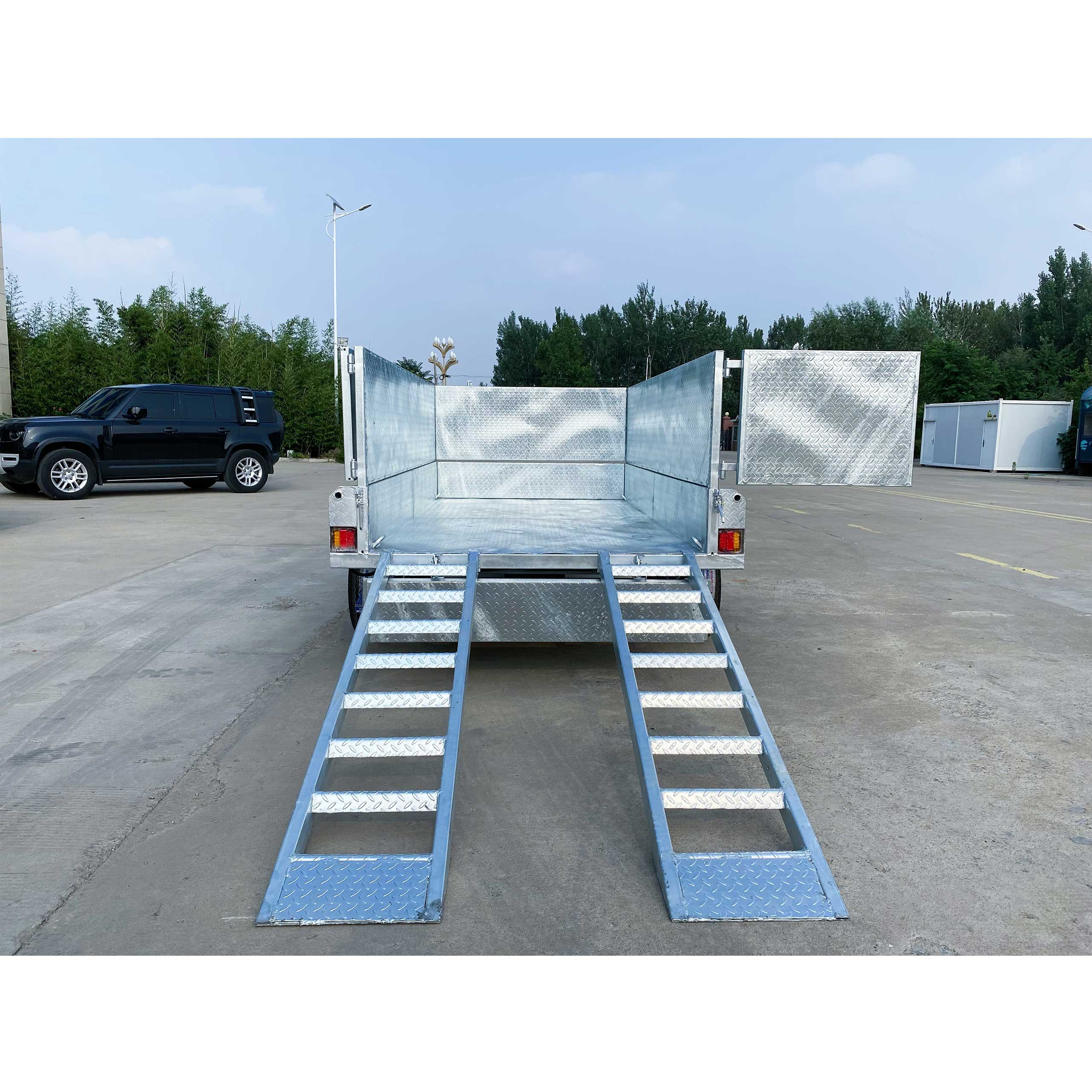 Double-box type self-unloading hydraulic agricultural trailer