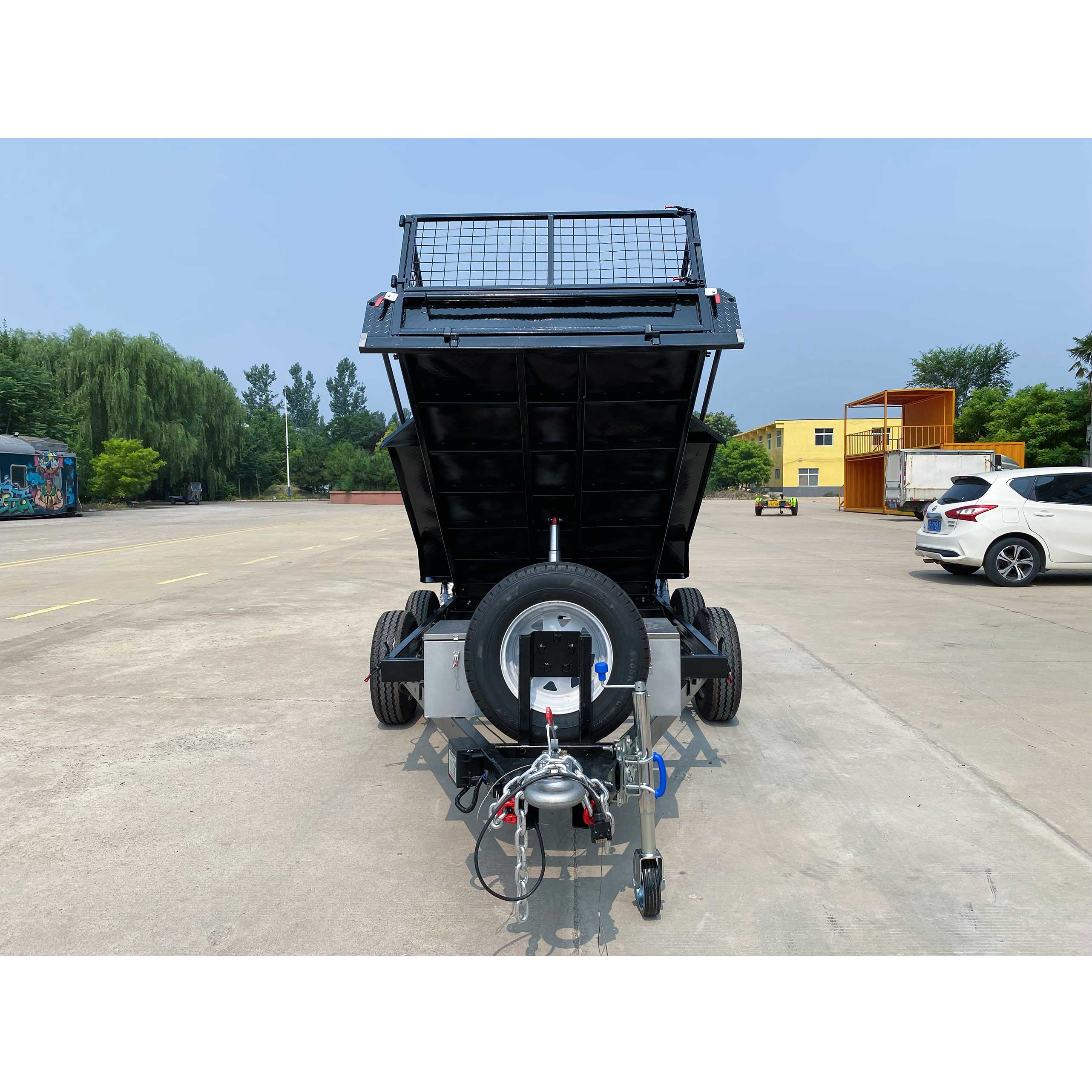 Double-axis black cage-type hydraulic dump truck trailer