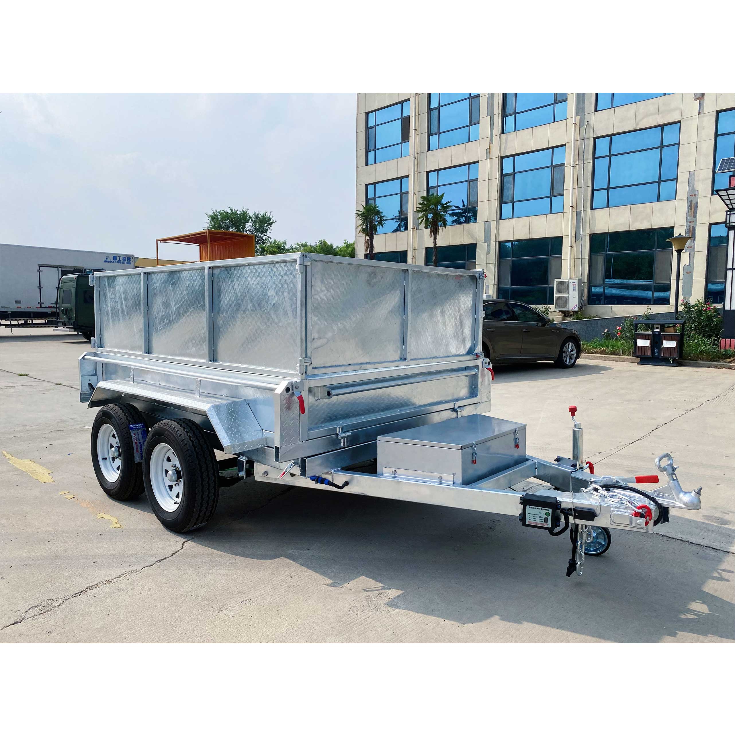 Double-box type self-unloading hydraulic agricultural trailer