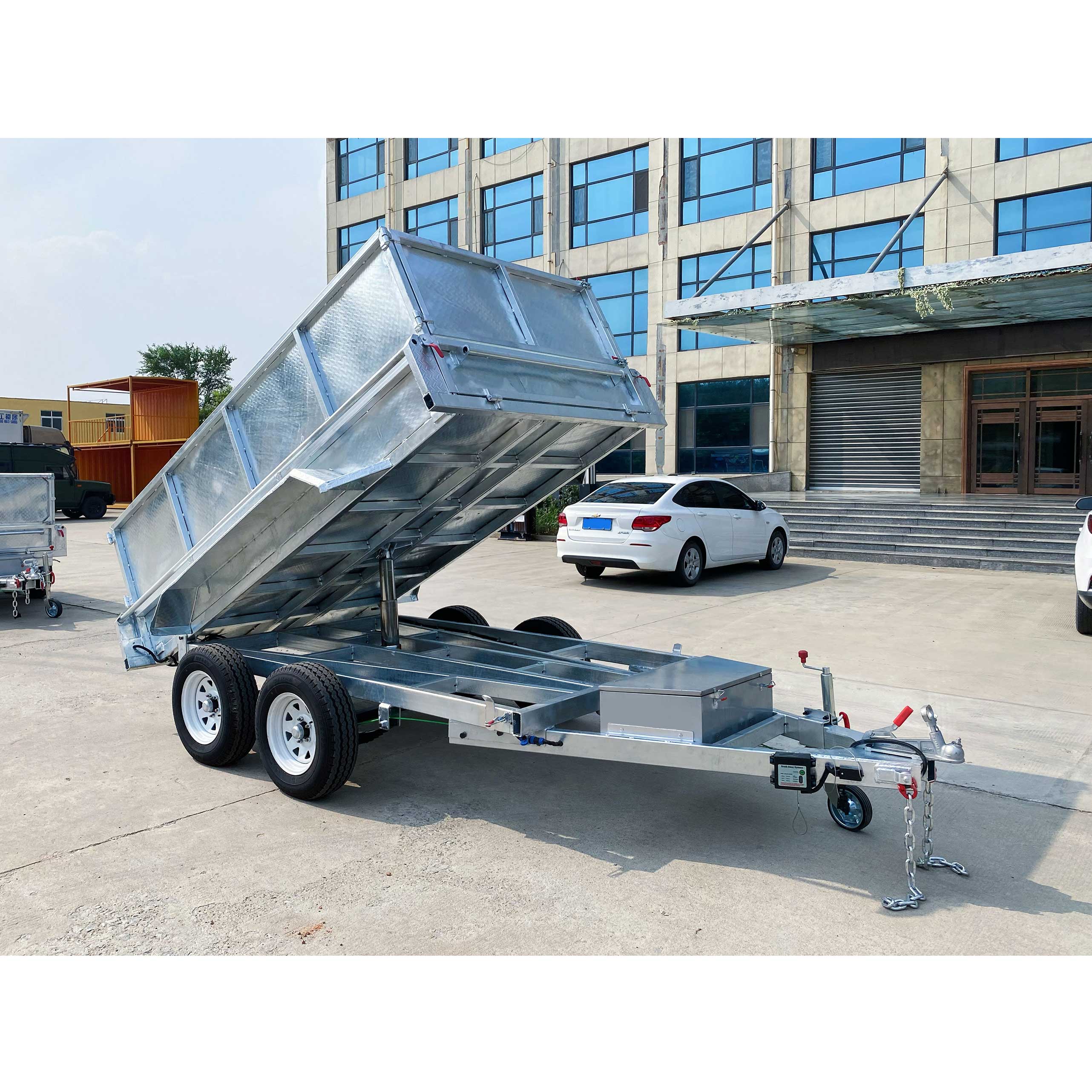 Double-box type self-unloading hydraulic agricultural trailer
