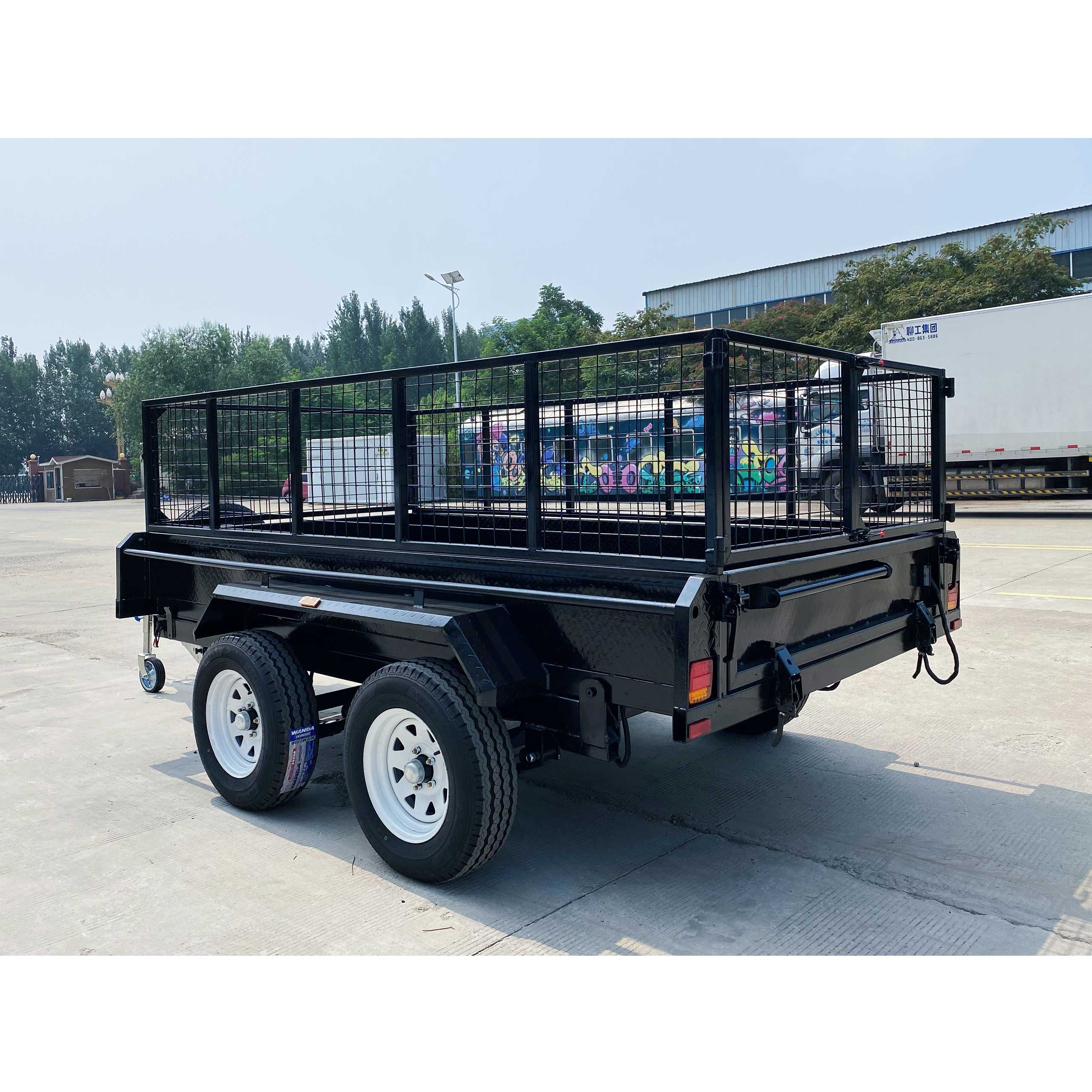 Double-axis black cage-type hydraulic dump truck trailer
