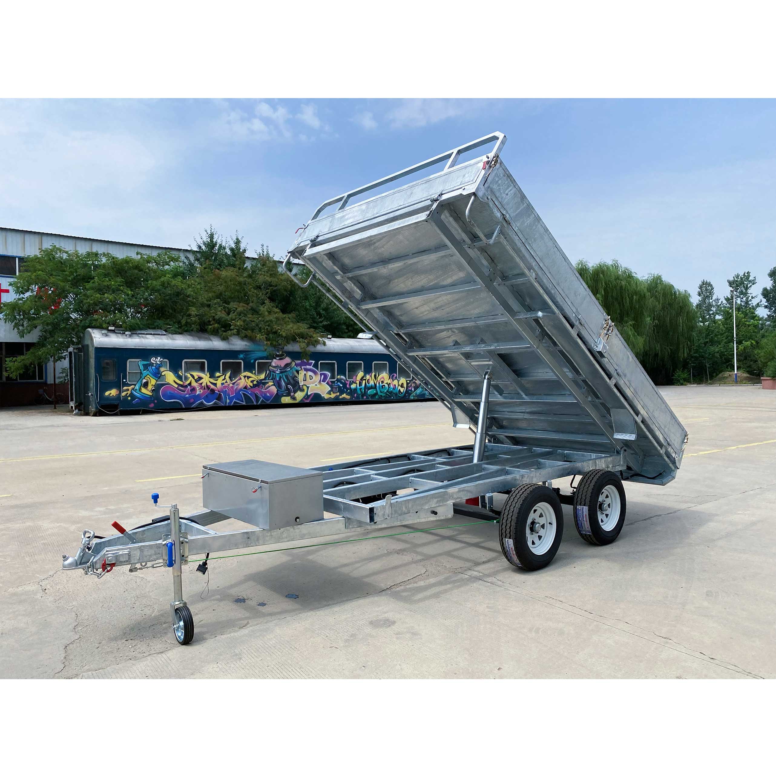Series-connected dual-axis self-unloading hydraulic trailer