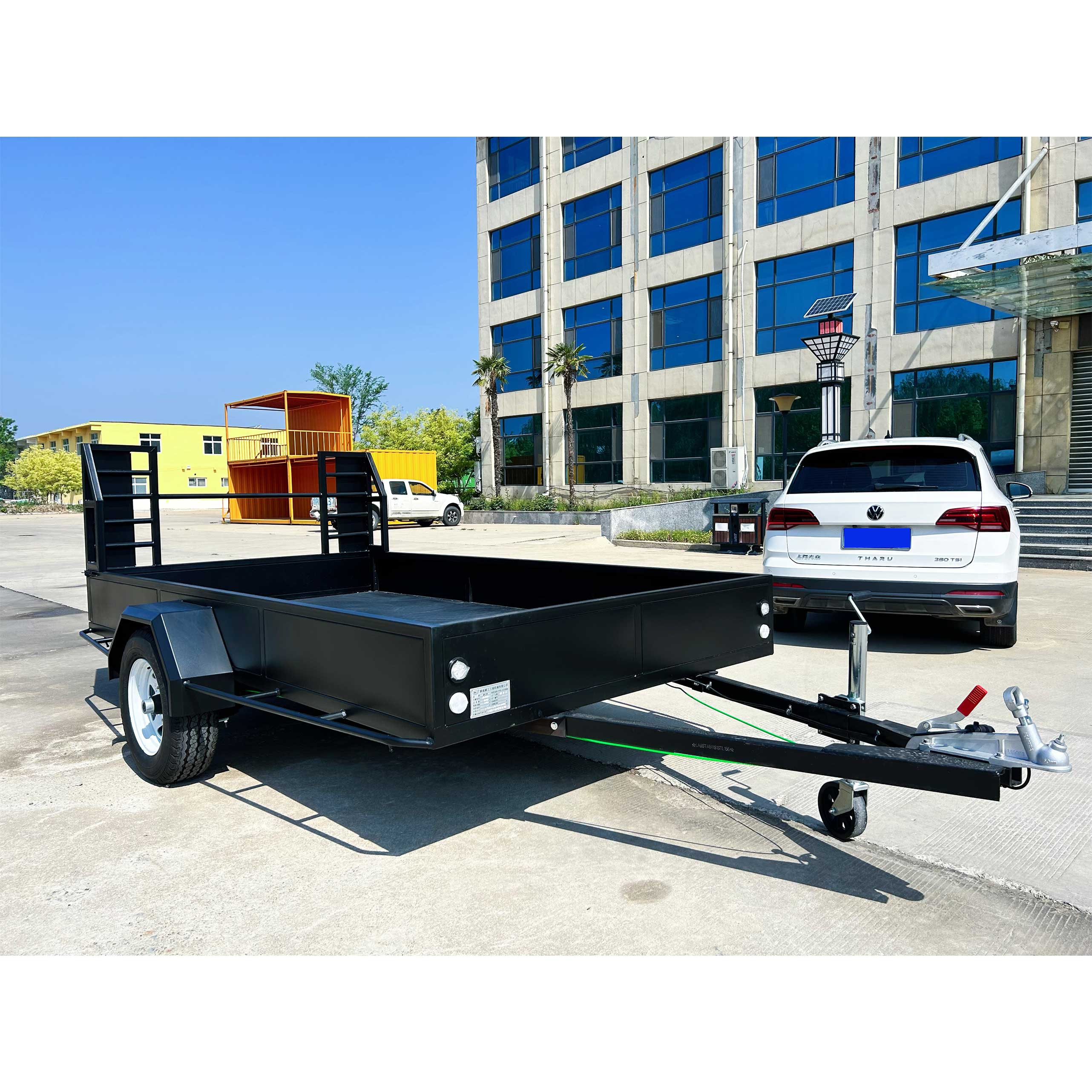 Agricultural fence truck trailer with mid-mounted axle for towing goods trailer