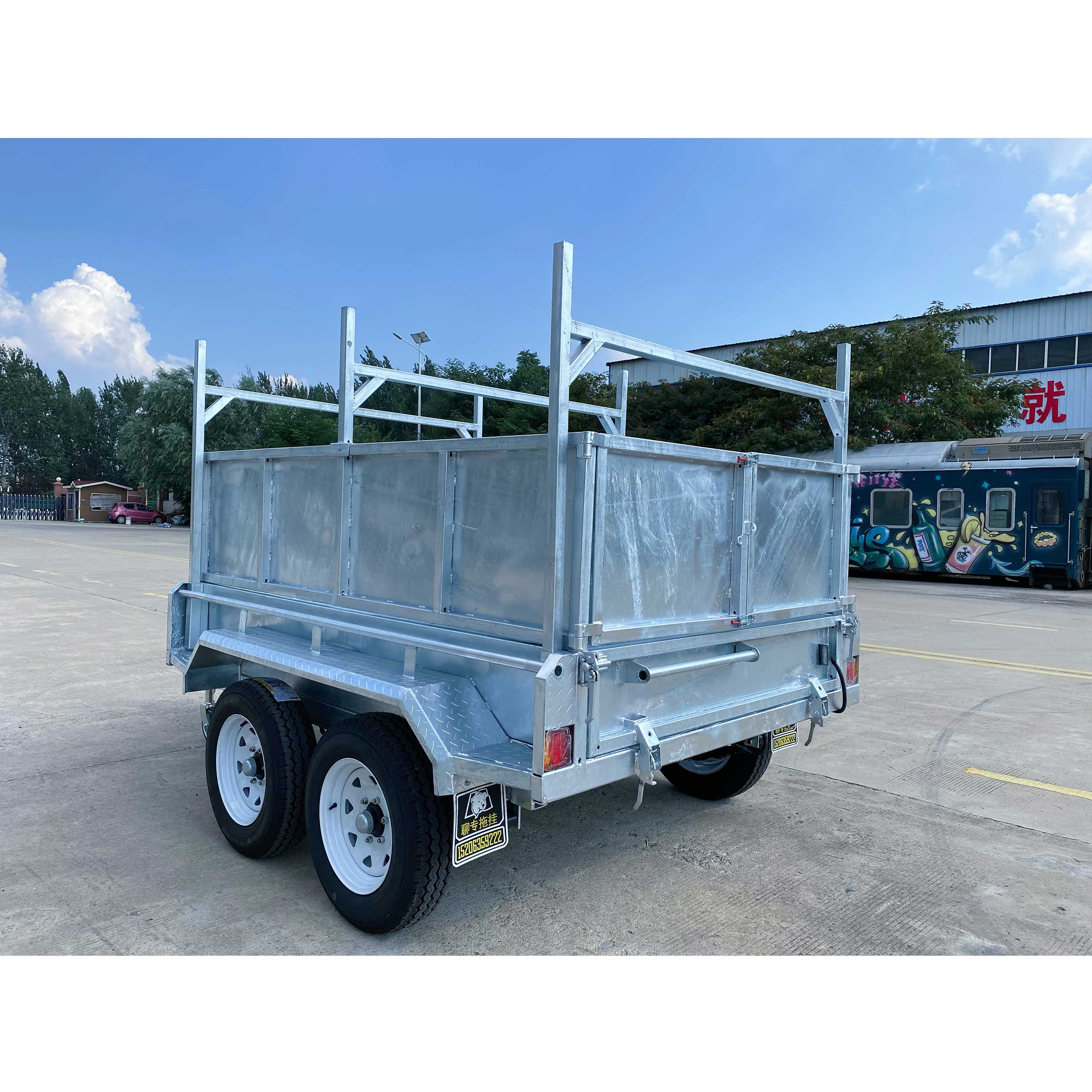 Double-axis dump box trailer