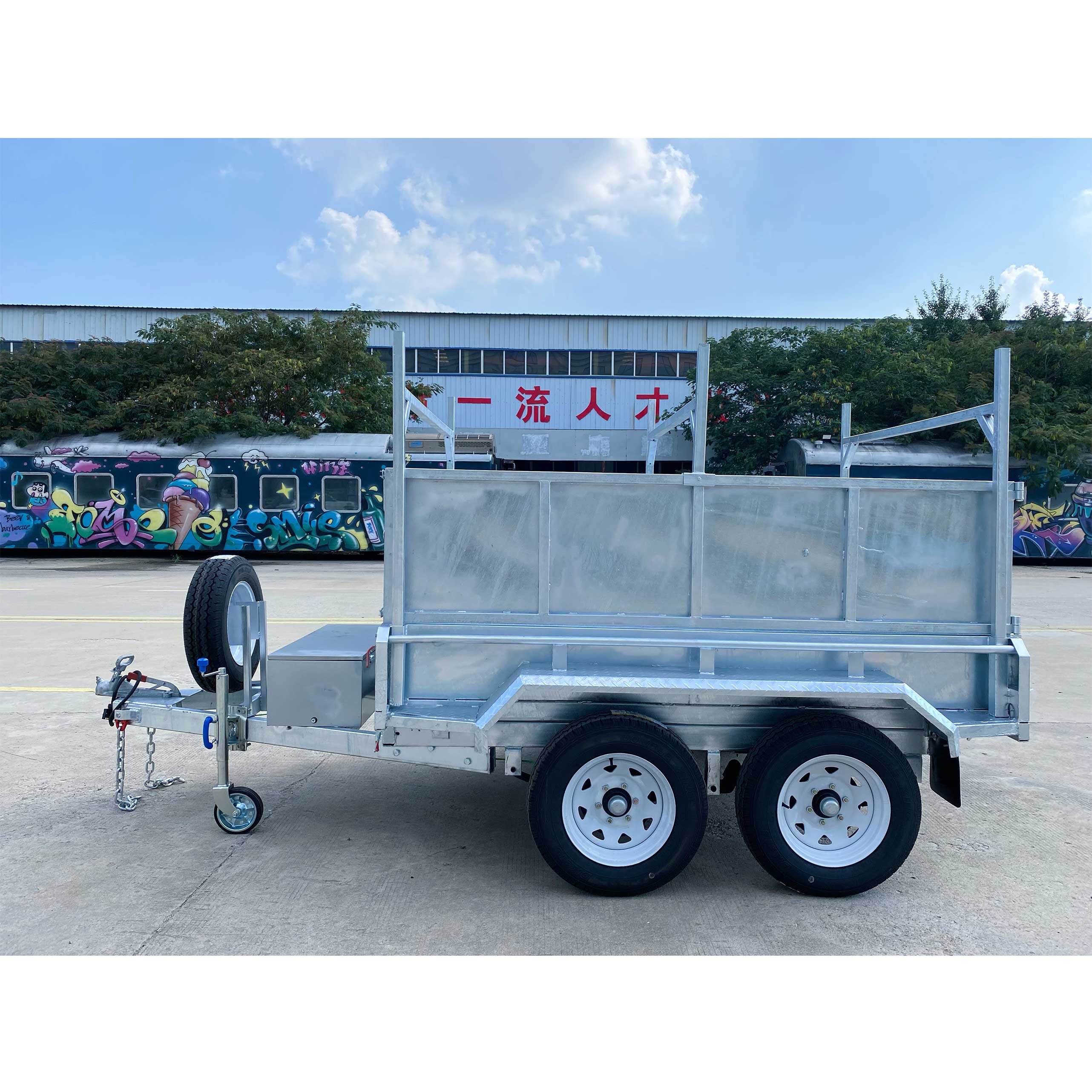 Double-axis dump box trailer