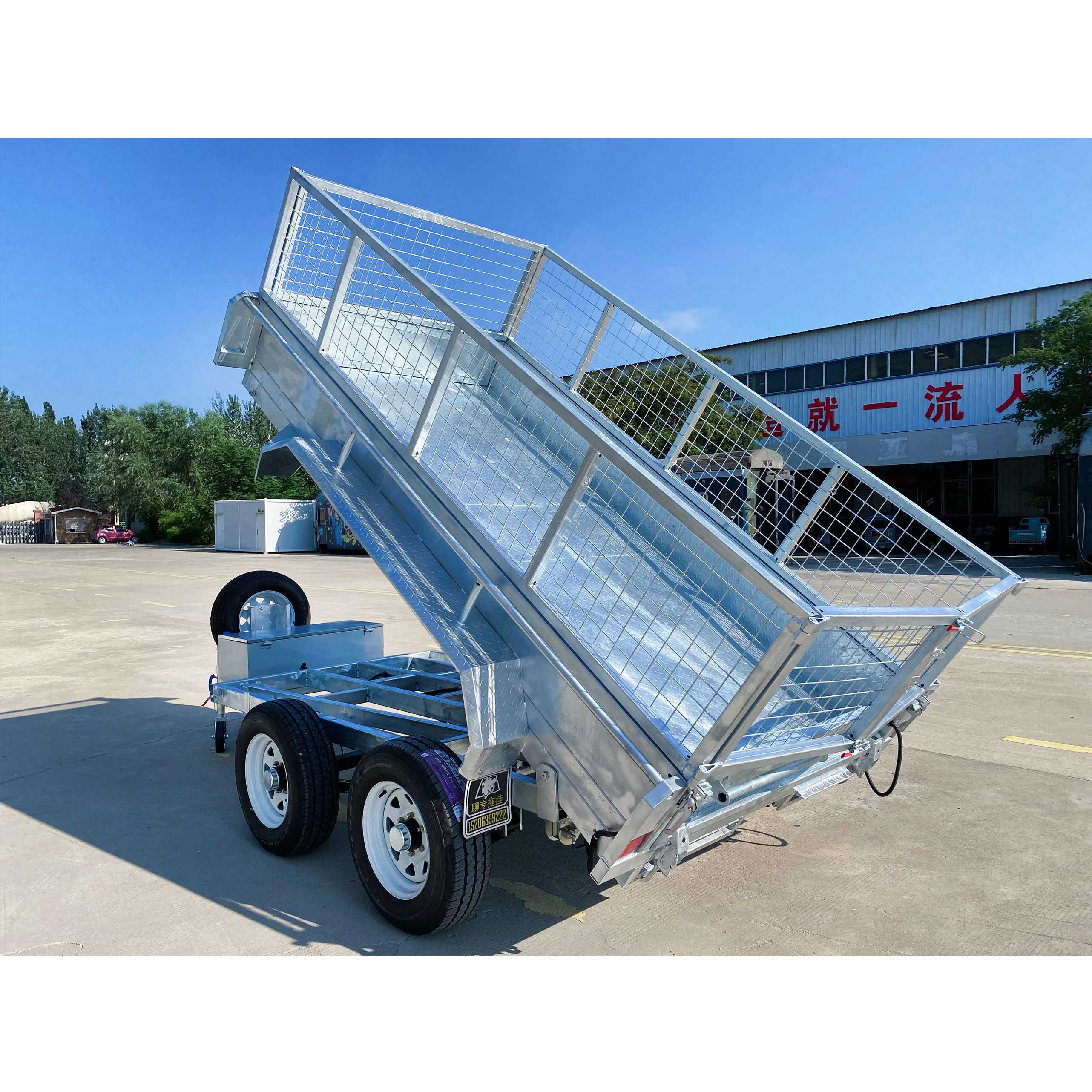 Double-axis tipping cage trailer with tires