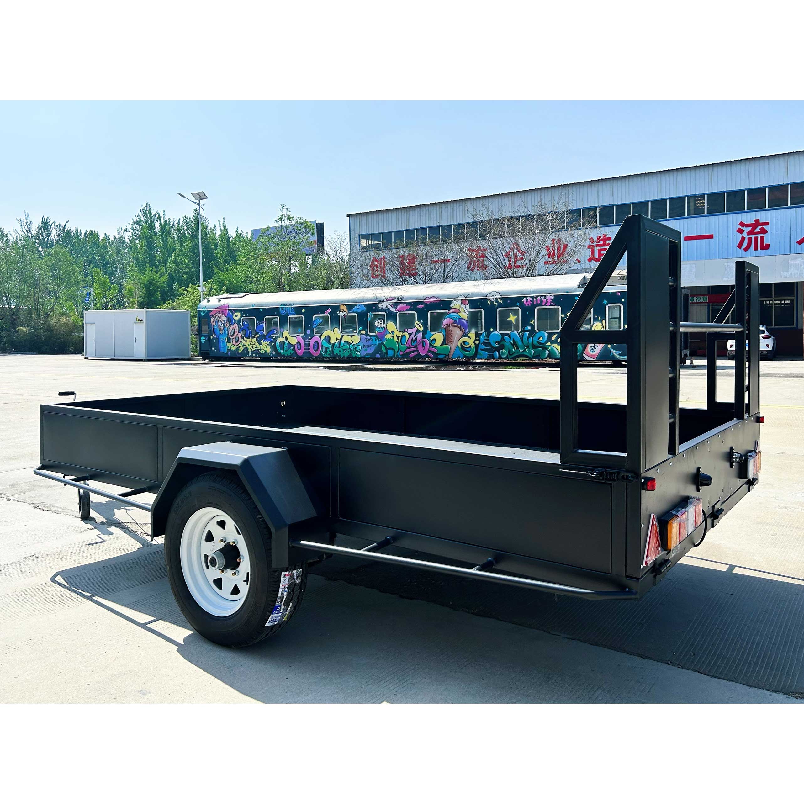 Agricultural fence truck trailer with mid-mounted axle for towing goods trailer