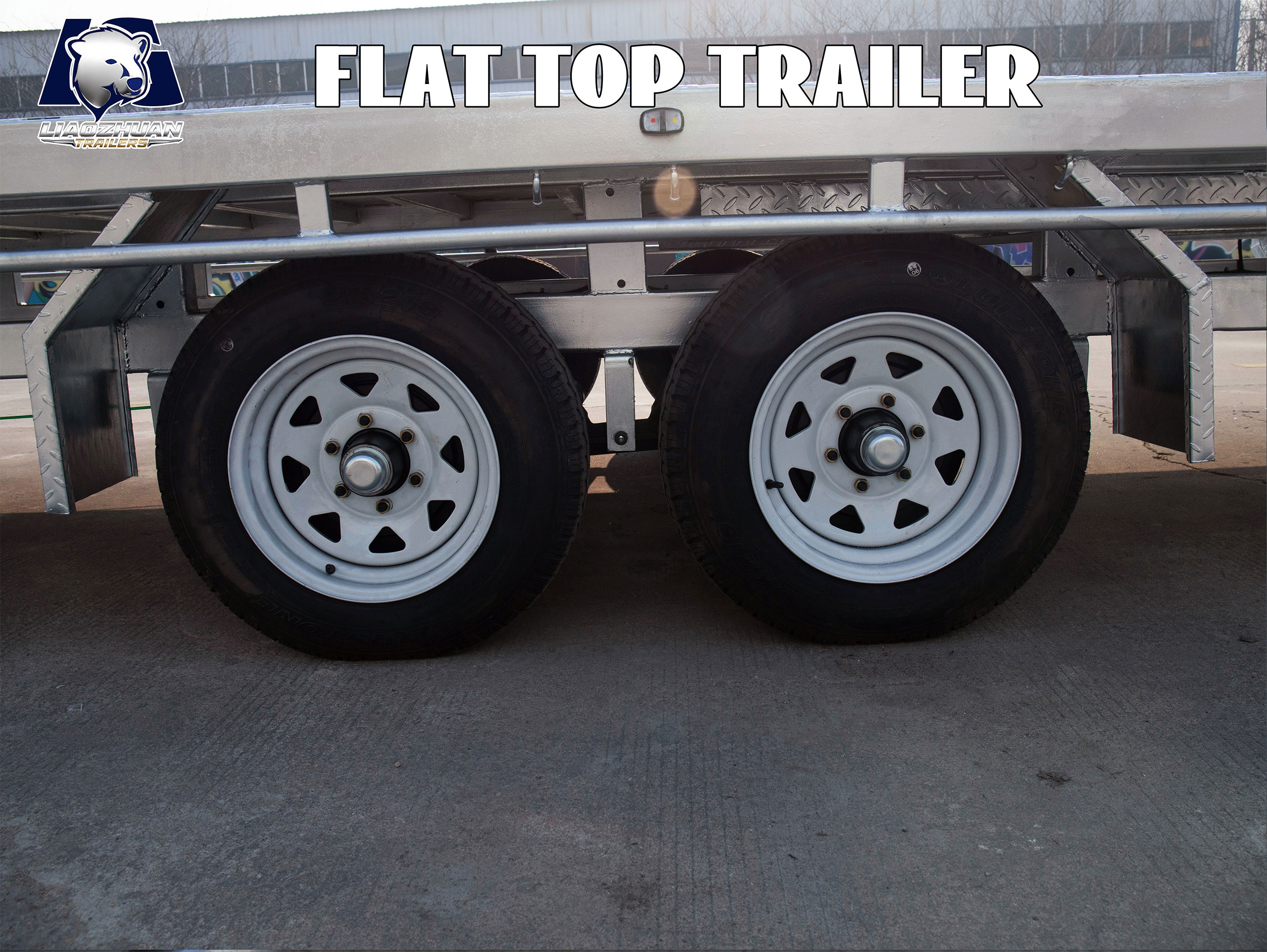 Au Double-axis flat-top trailer