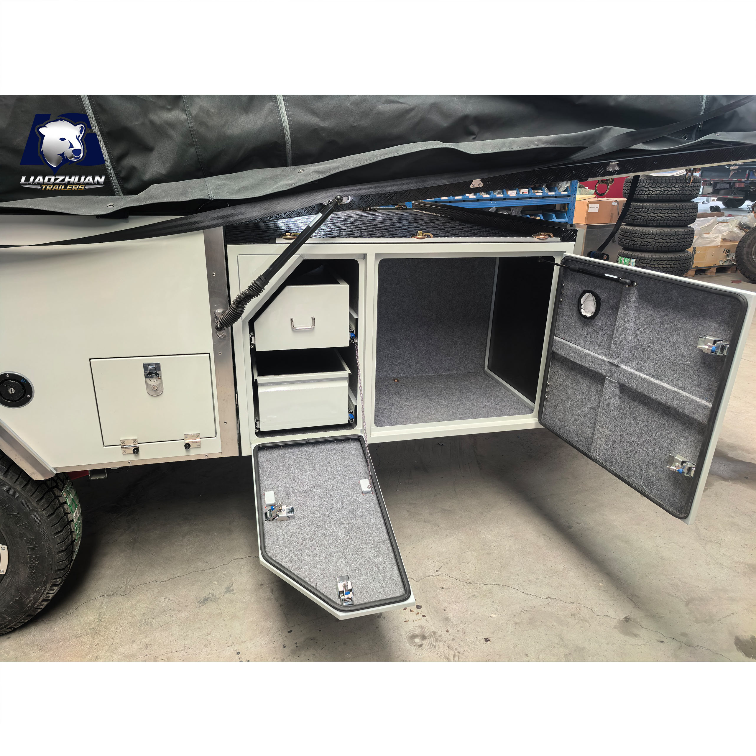 Front-folding hard-floor camping trailer