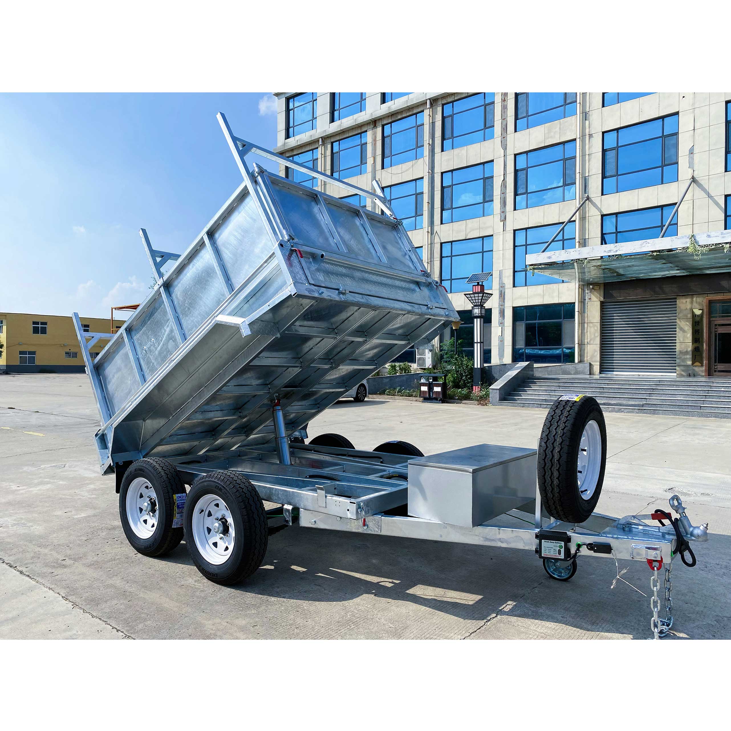 Double-axis dump box trailer