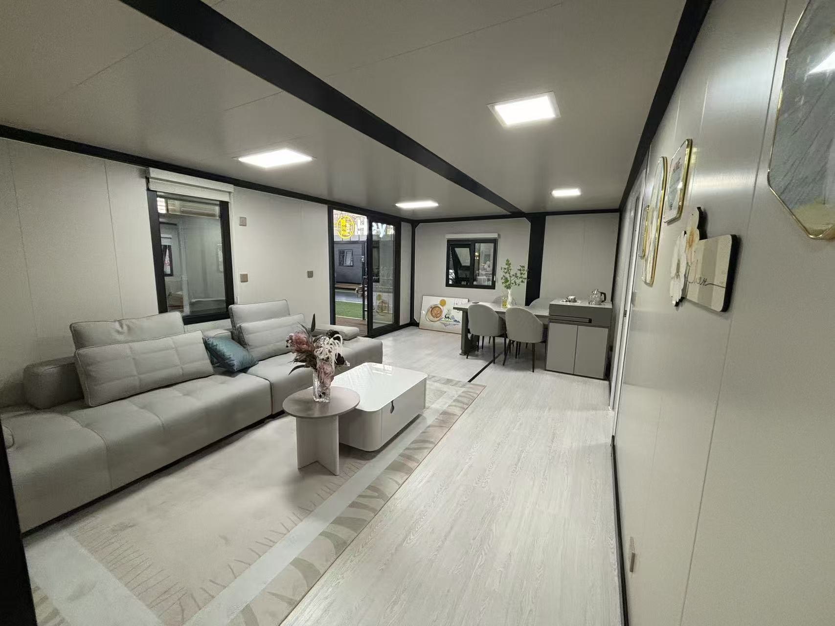 Interior of a FACTORYBUILT prefab unit with living, dining and kitchen