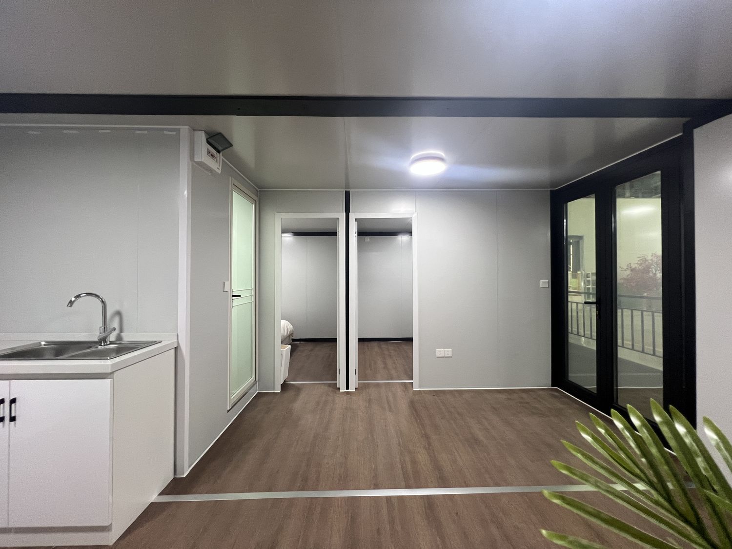 20ft Brown Wood-Grain Expandable Container House with Terrace | 38 sqm + Deck