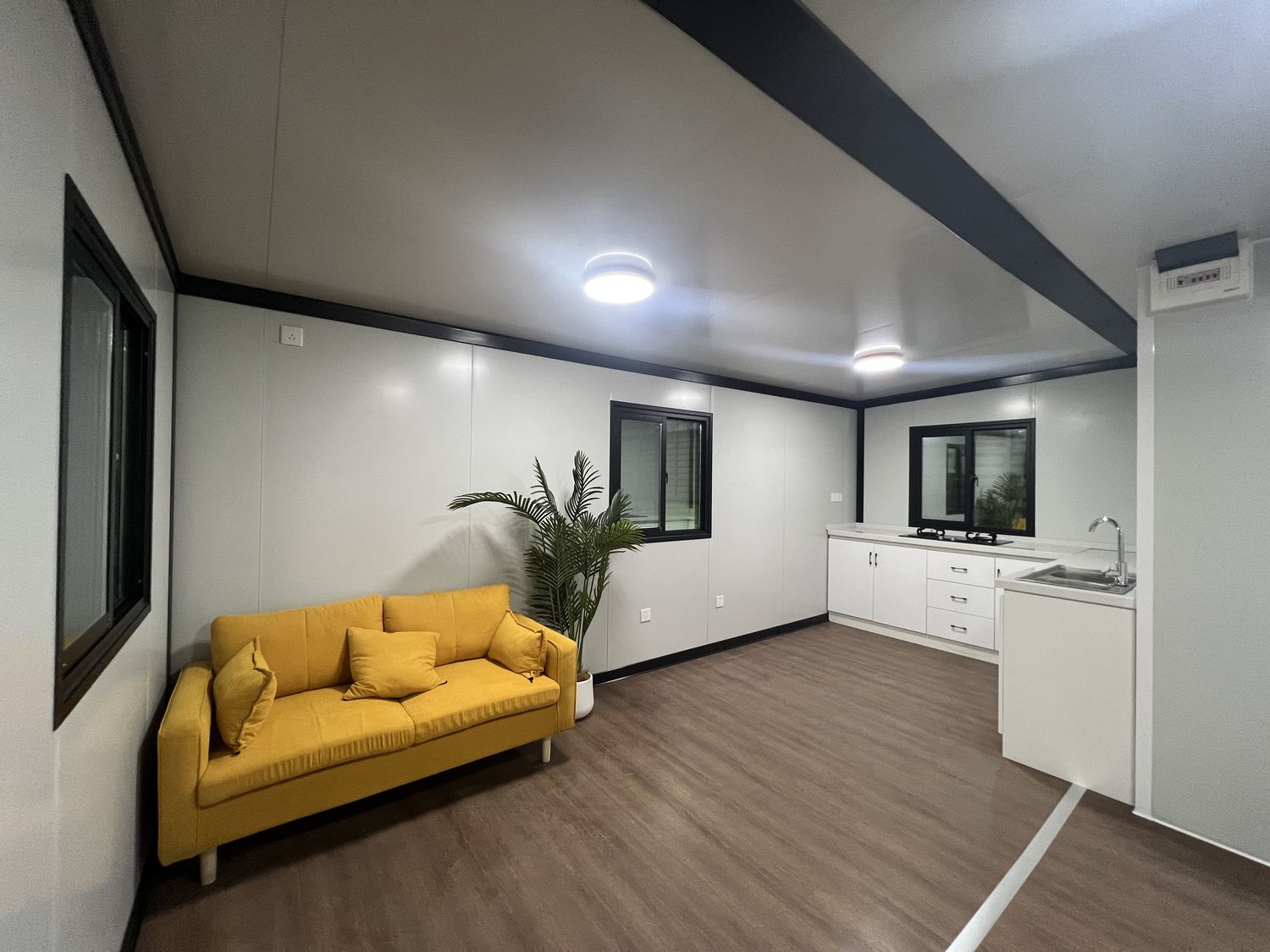 20ft Brown Wood-Grain Expandable Container House with Terrace | 38 sqm + Deck