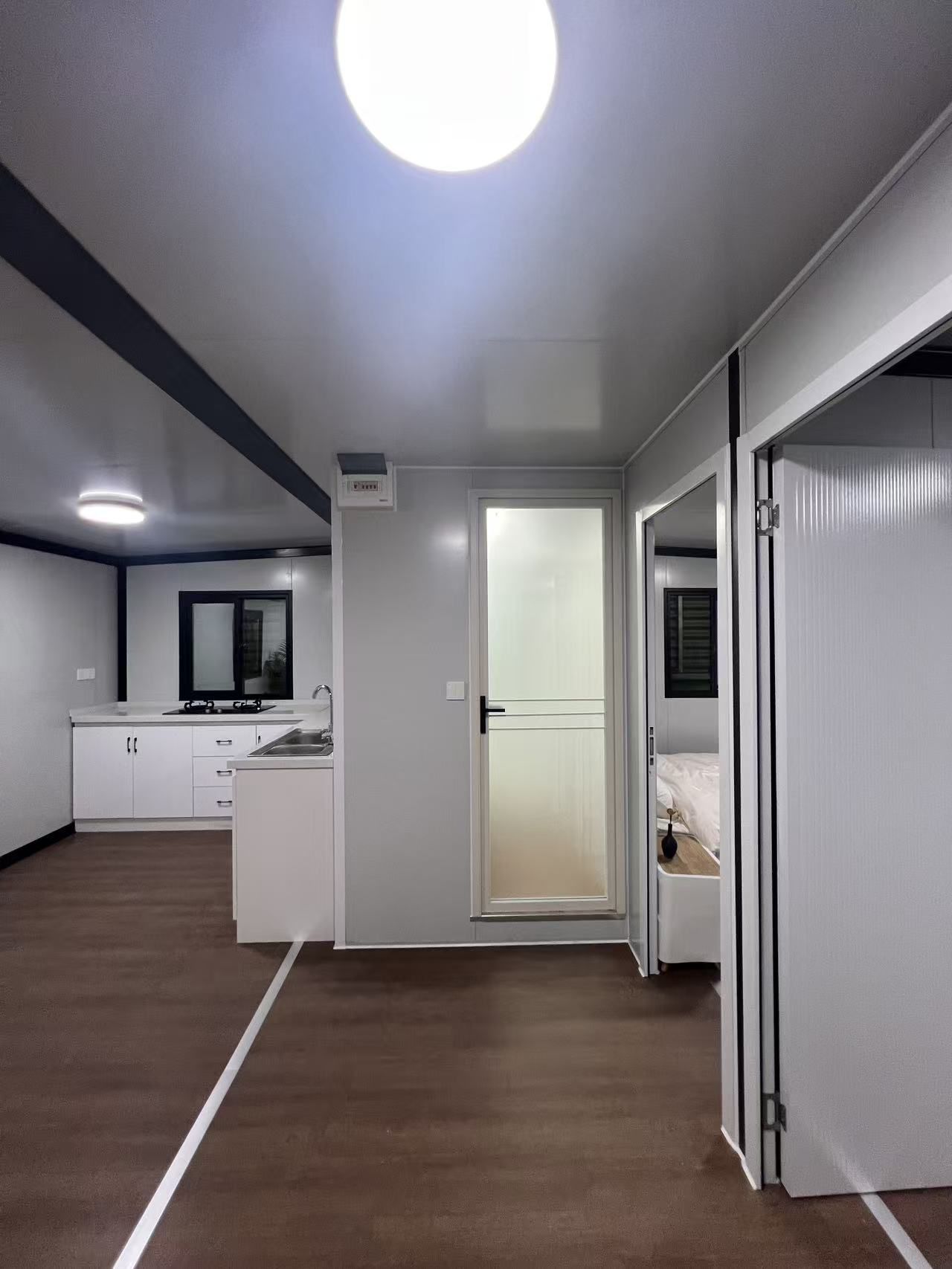 20ft Brown Wood-Grain Expandable Container House with Terrace | 38 sqm + Deck