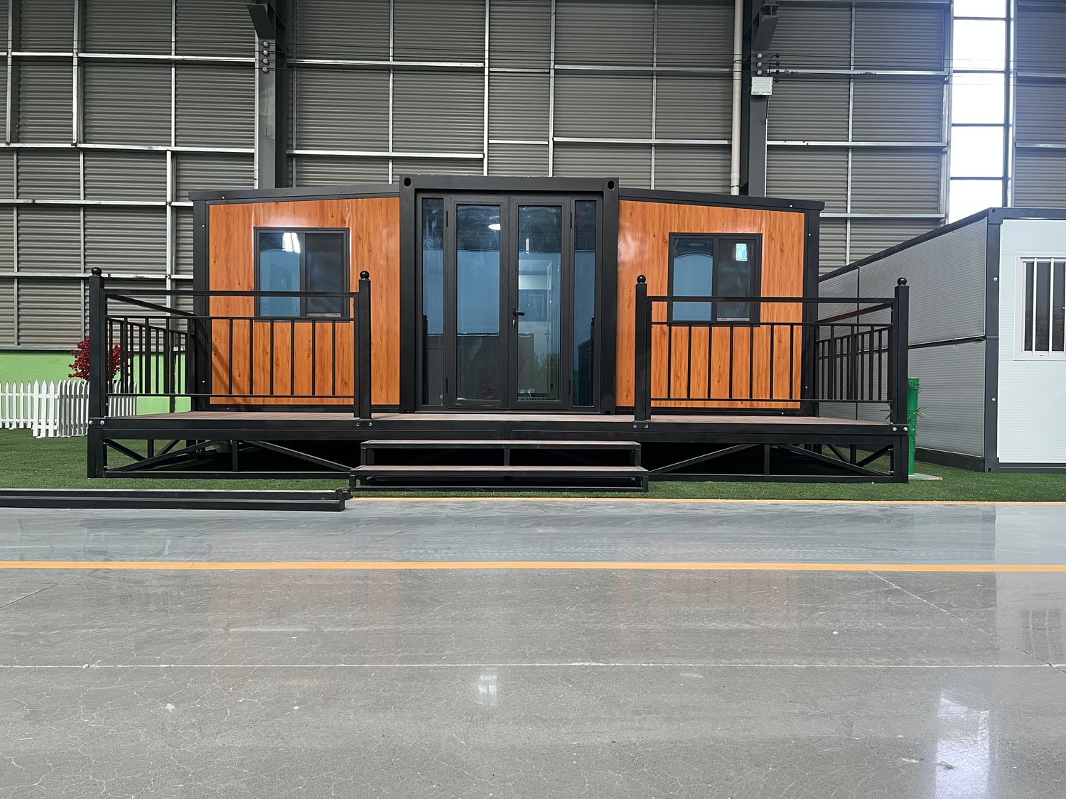 20ft Brown Wood-Grain Expandable Container House with Terrace | 38 sqm + Deck