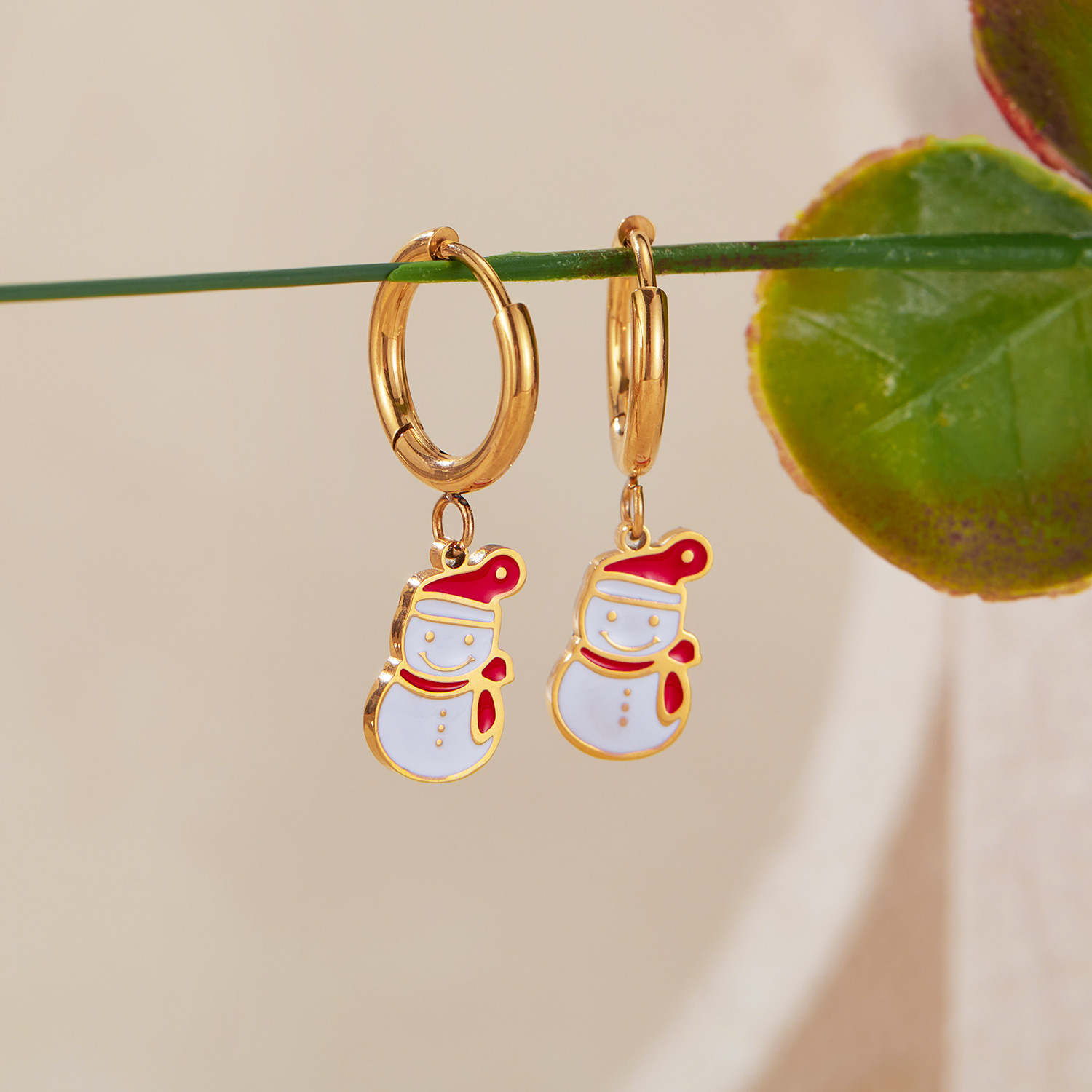 European and American new earrings made of titanium steel for women, niche and versatile design, dripping oil, small snowman earrings and accessories