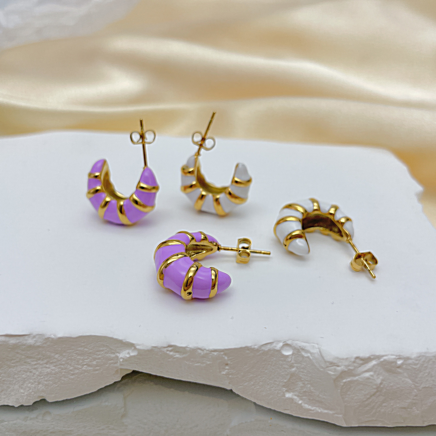 European and American style jewelry fashion trend retro earrings French light luxury drip oil temperament versatile titanium steel earrings for women