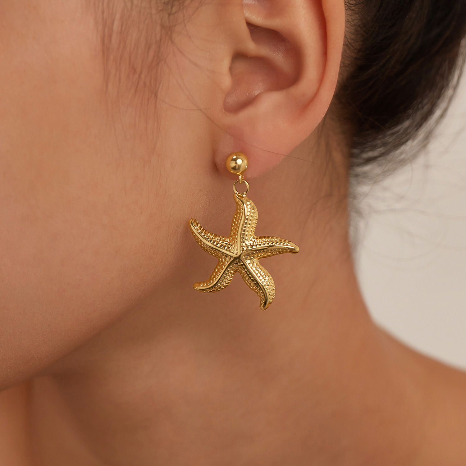 Jewelry wholesale stainless steel starfish earrings for women, fashionable, simple, niche, versatile design earrings