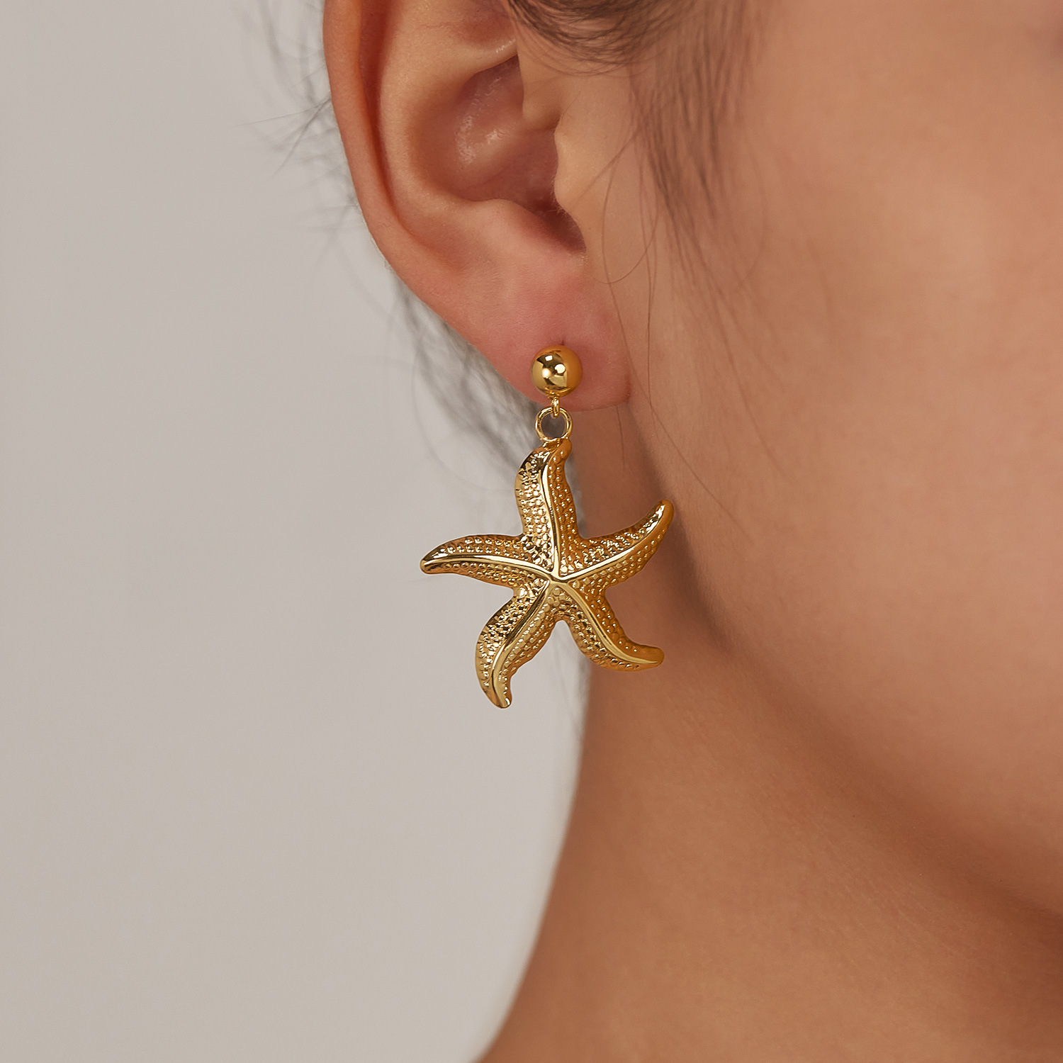 Jewelry wholesale stainless steel starfish earrings for women, fashionable, simple, niche, versatile design earrings