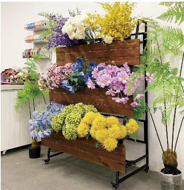 Three-layer flower material rack