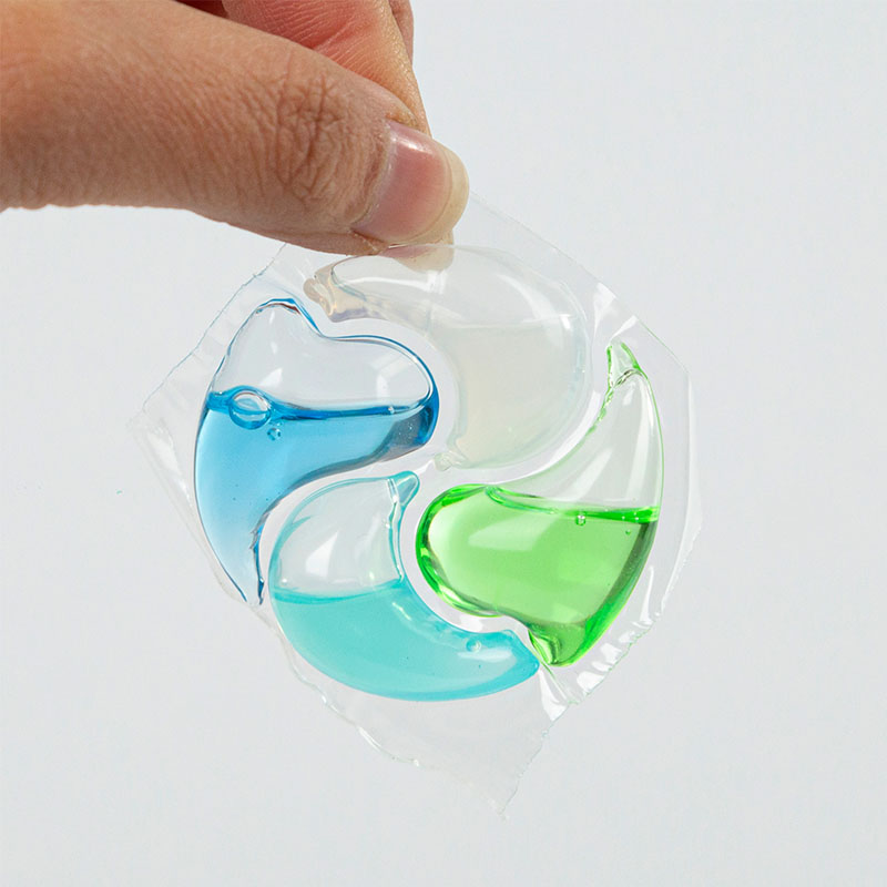 Laundry detergent pod 4D, green, blue, white