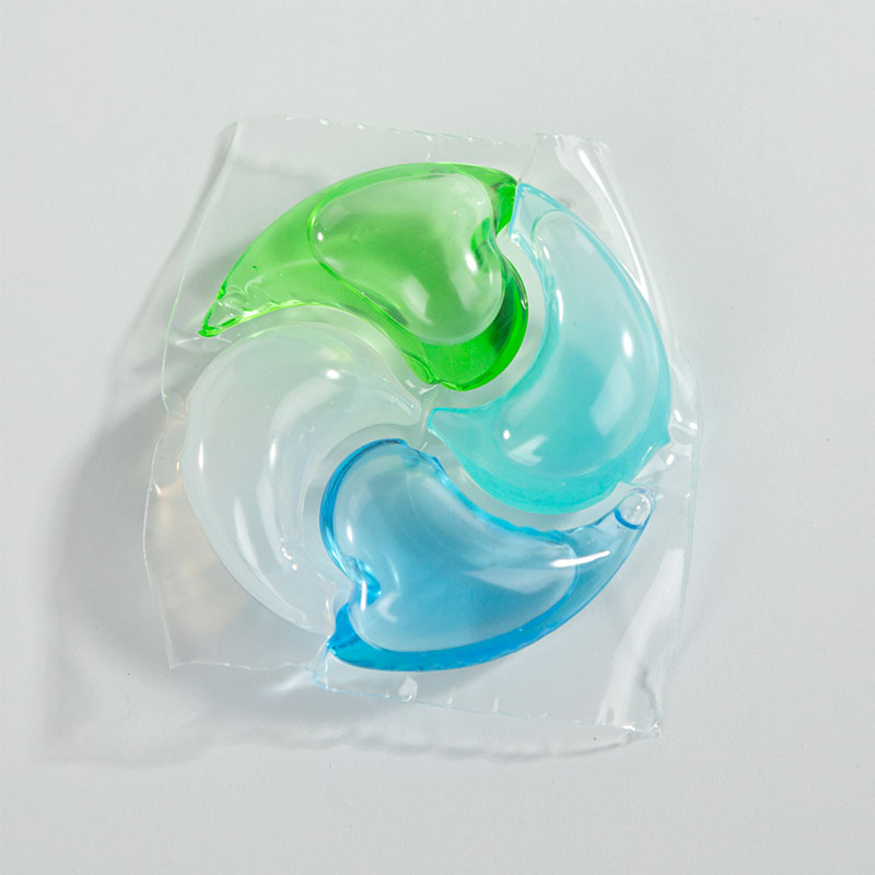 Laundry detergent pod 4D, green, blue, white