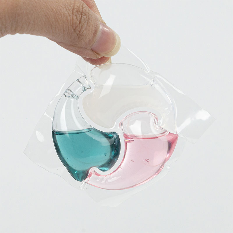 Laundry detergent pod 3D pink, green, and white