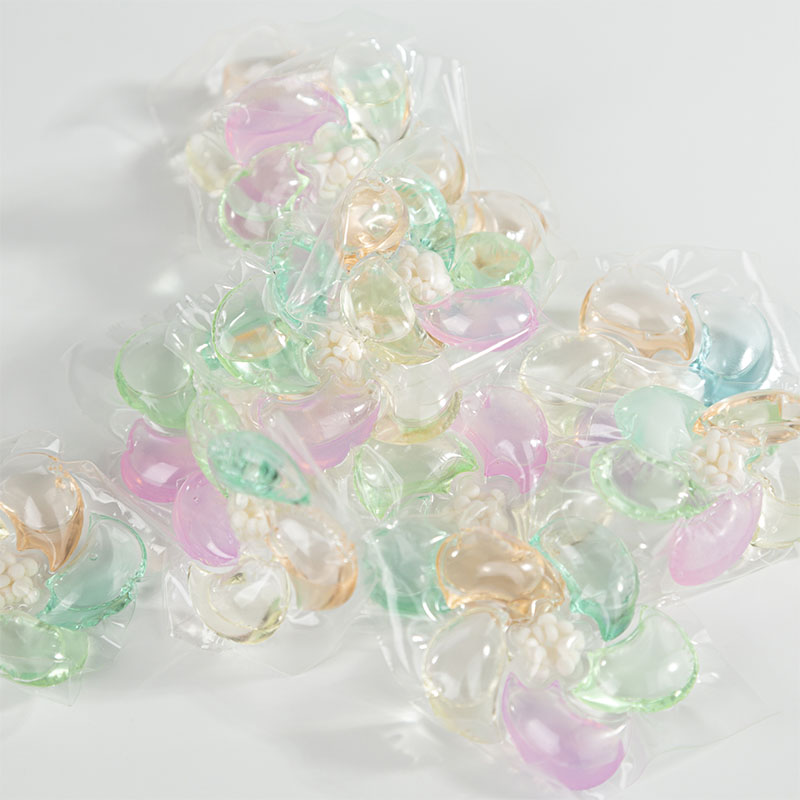 Капсула стирального порошка 6D, с розовым, зелёным, синим, оранжевым и жёлтым цветами