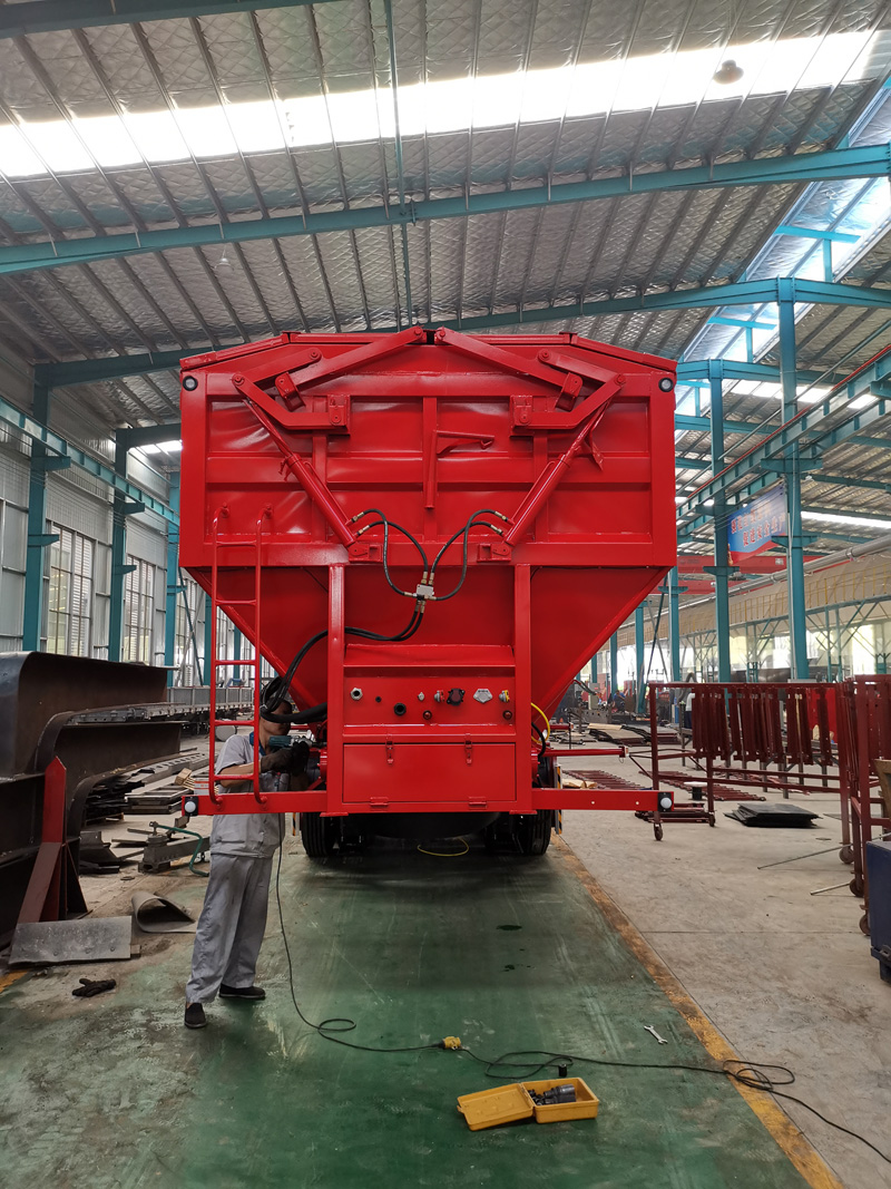 Tracked dump semi-trailer