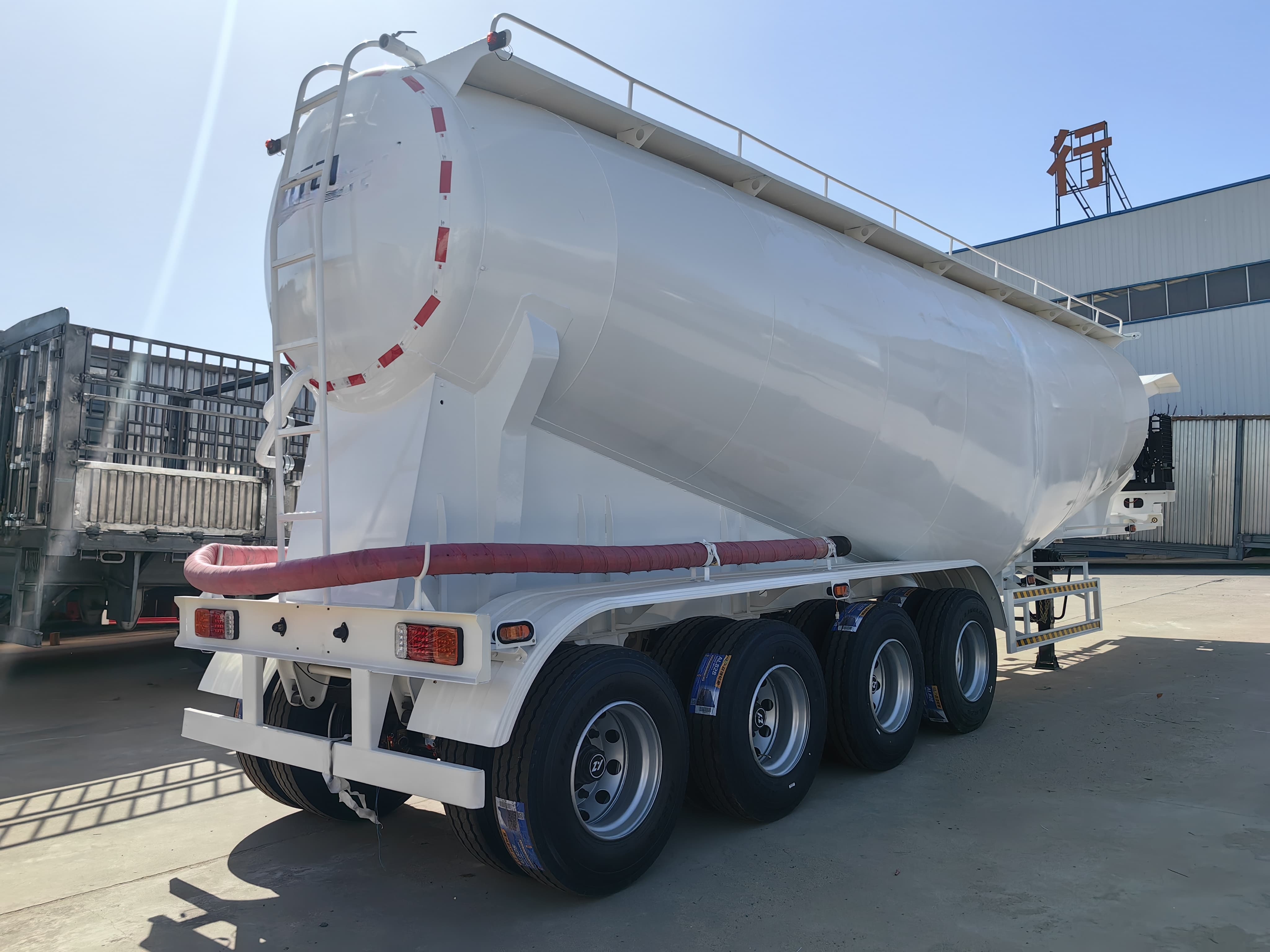 semi-trailer for transporting powder and granular materials
