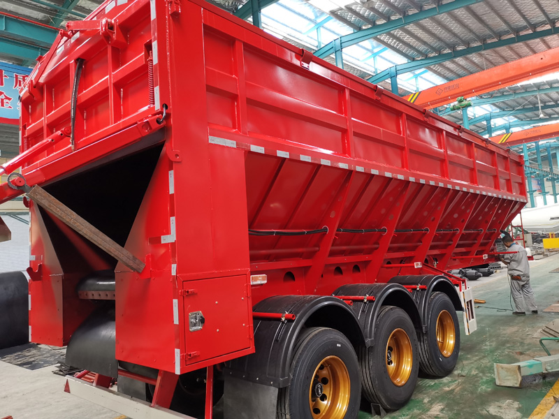 Tracked dump semi-trailer