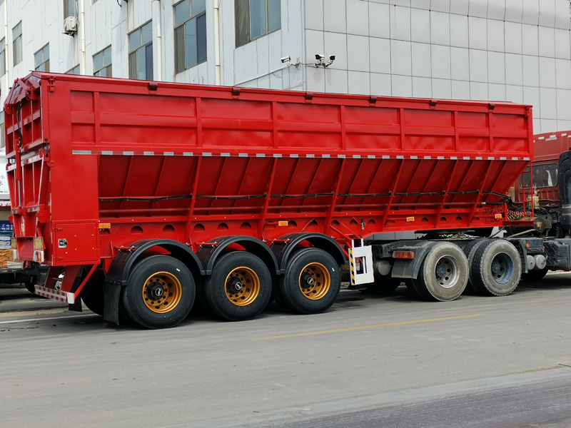 Tracked dump semi-trailer