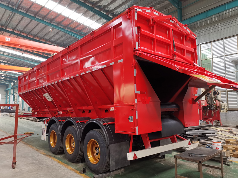 Tracked dump semi-trailer