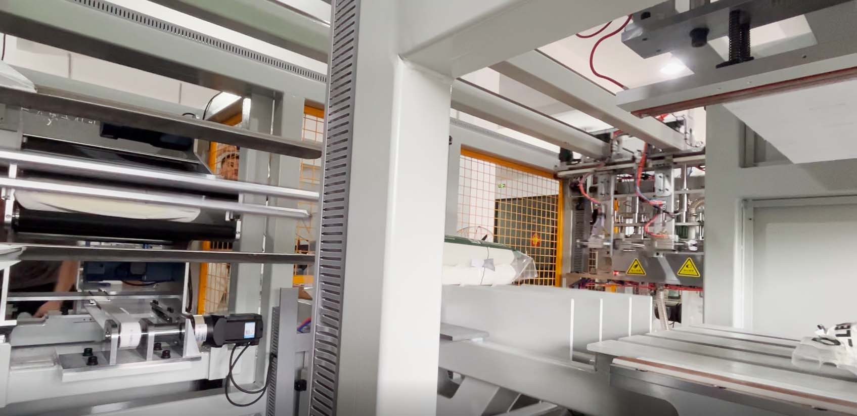 枕芯自动打卷包装设备