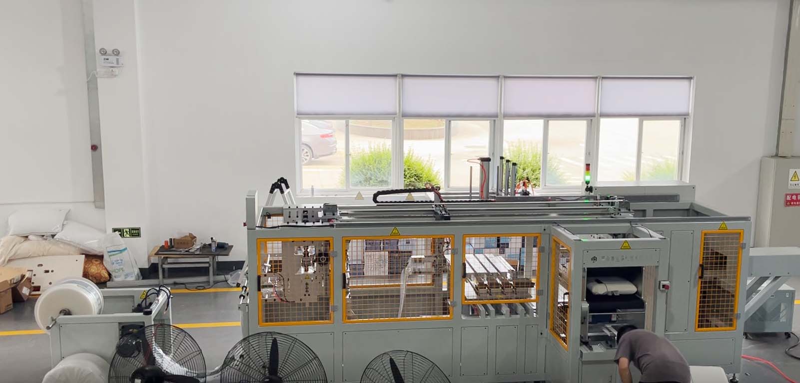 枕芯自动打卷包装设备