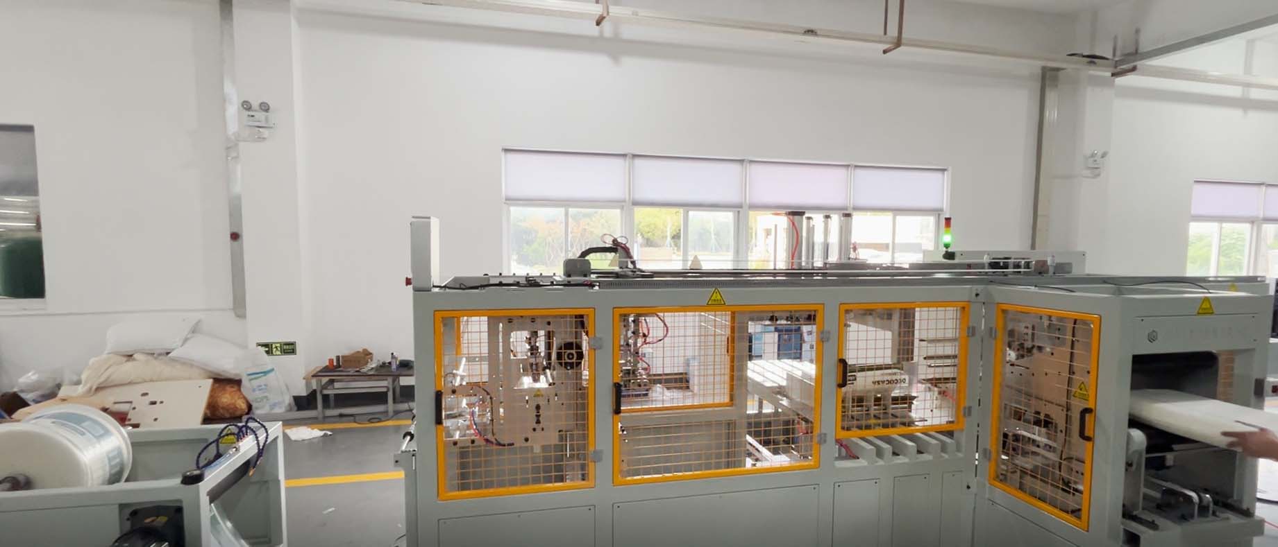 枕芯自动打卷包装设备