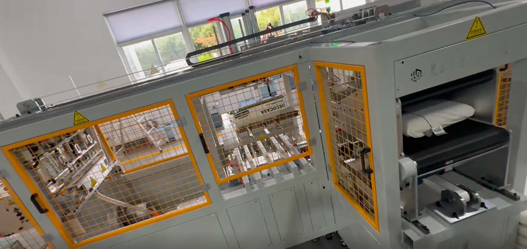 枕芯自动打卷包装设备