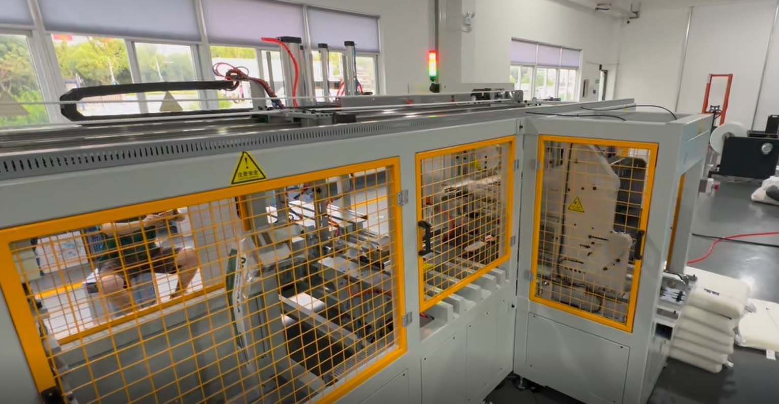 枕芯自动打卷包装设备