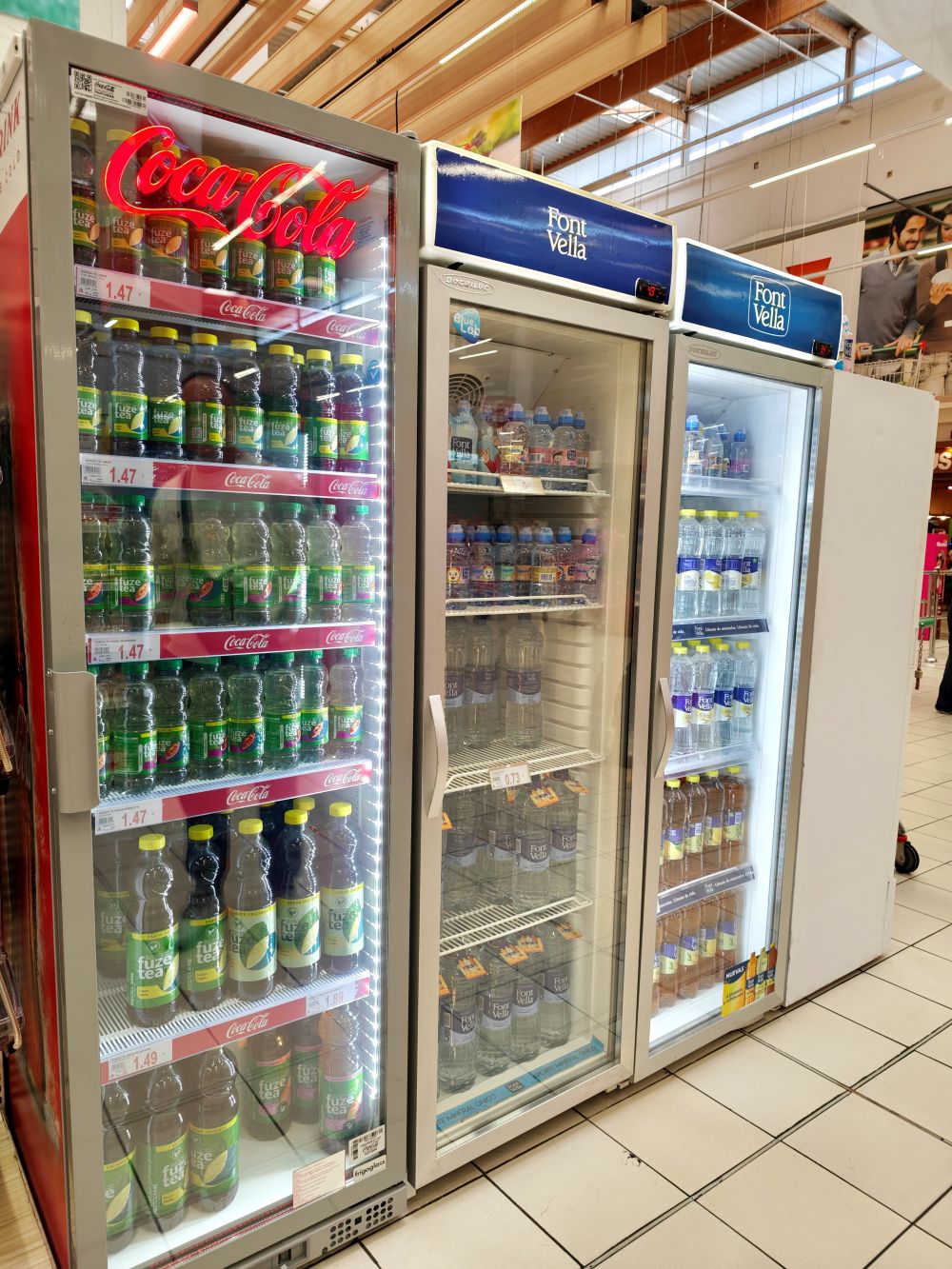 Coca-Cola beverage cooler glass door