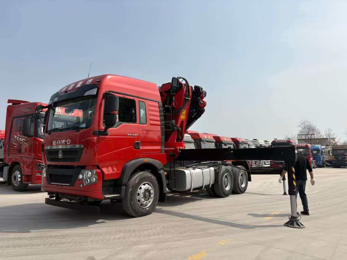Trailer-mounted folding boom truck-mounted crane
